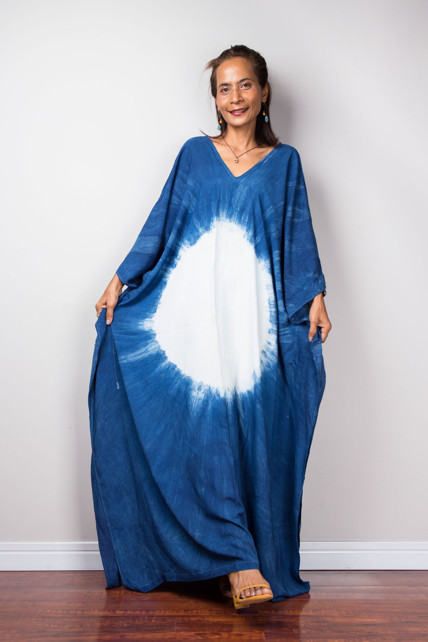 Indigo caftan by Nuichan. Blue tie dye kaftan dress with v neck