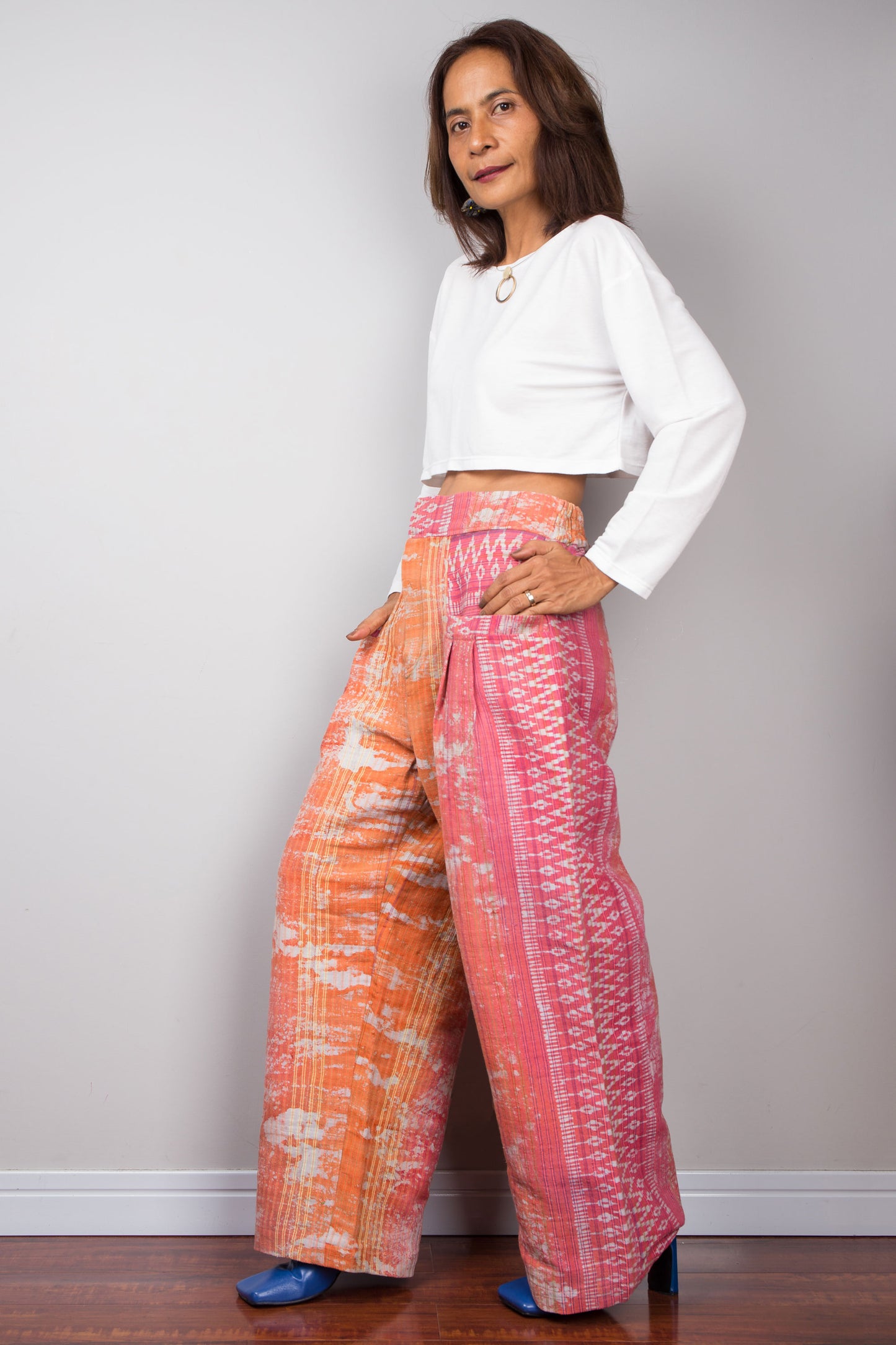 Shop these one-of-a-kind pink orange tie-dye hemp pants at Nuichan.com, designed for comfort and style, ideal for casual outings or lounging.