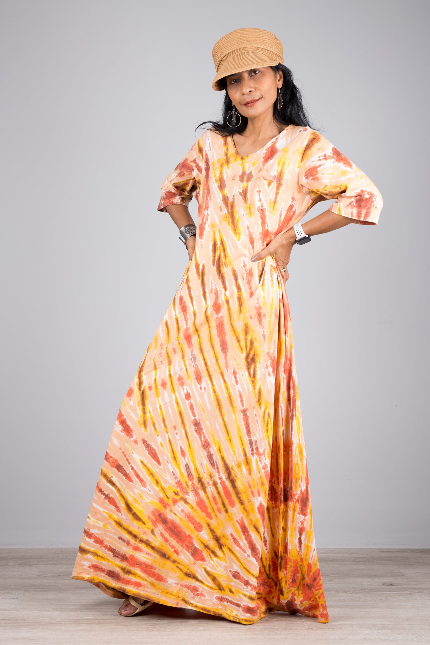 Orange tie dye maxi dress by Nuichan. Mid length sleeve tie dye dress