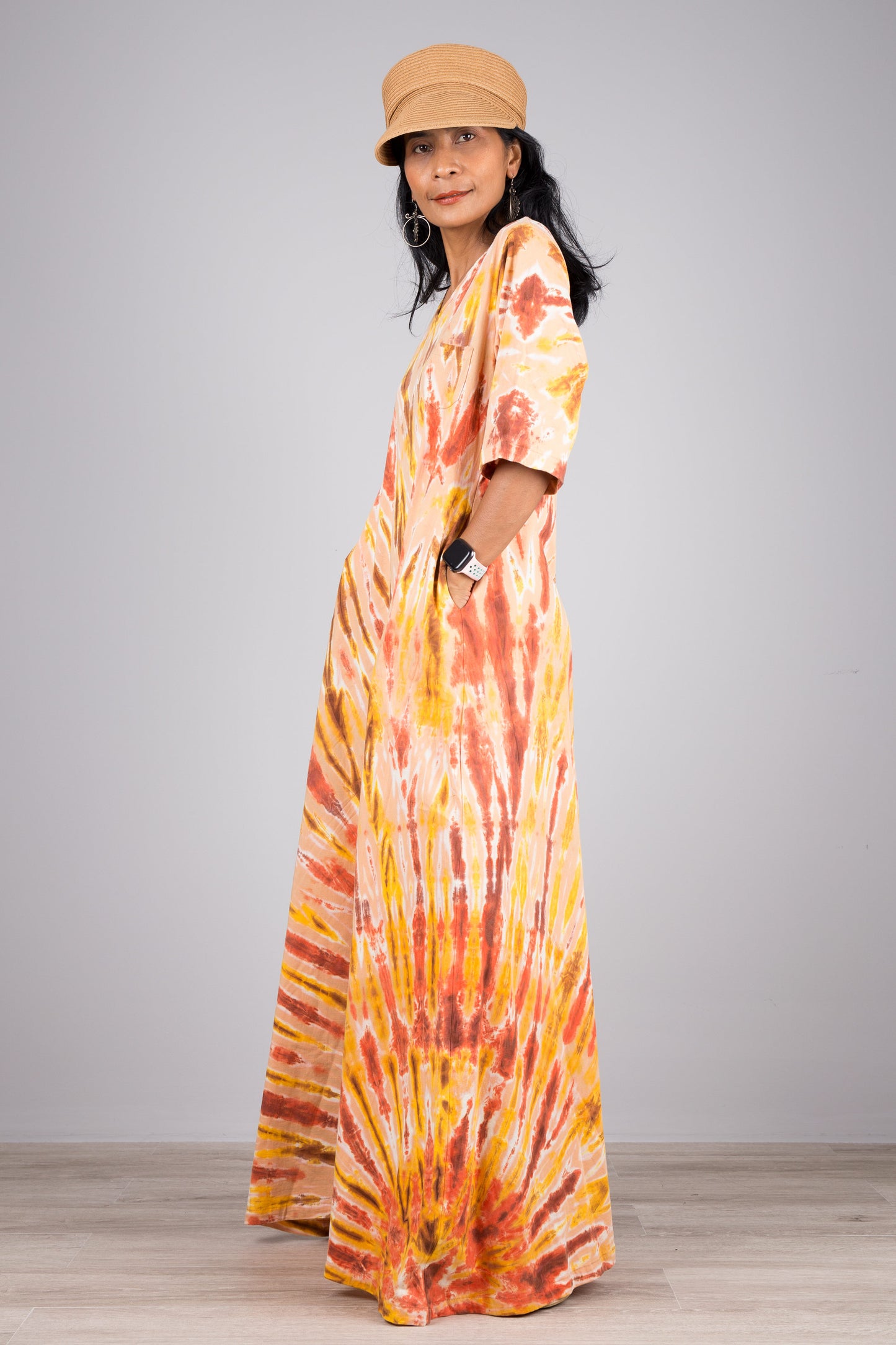 Tie dye dress in orange. Maxi dress style with mid length sleeves