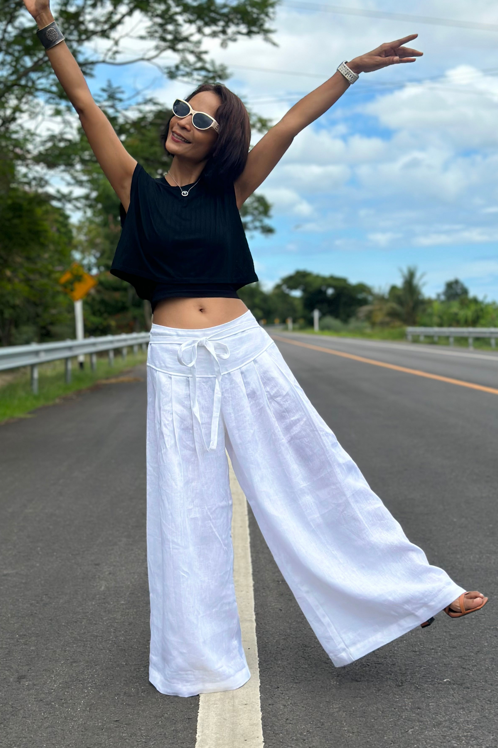 White palazzo pants. White high waist summer pants. Loose fit pleated trousers by Nuichan