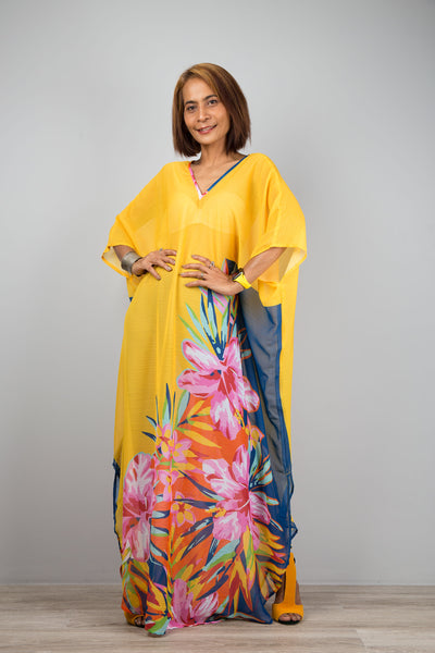 Yellow chiffon kaftan maxi dress with v neck.  See through beach dress with big floral print on the side. Design by Nuichan