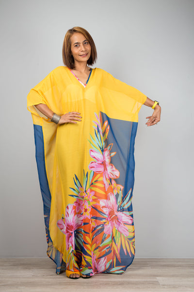 Yellow chiffon kaftan maxi dress with v neck.  See through beach dress with big floral print on the side. Design by Nuichan