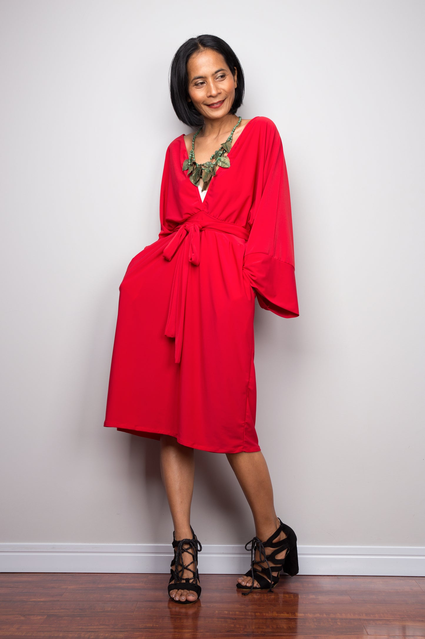 Shop for short red dress. Off shoulder red dress by Nuichan. Long sleeve red dress with pockets