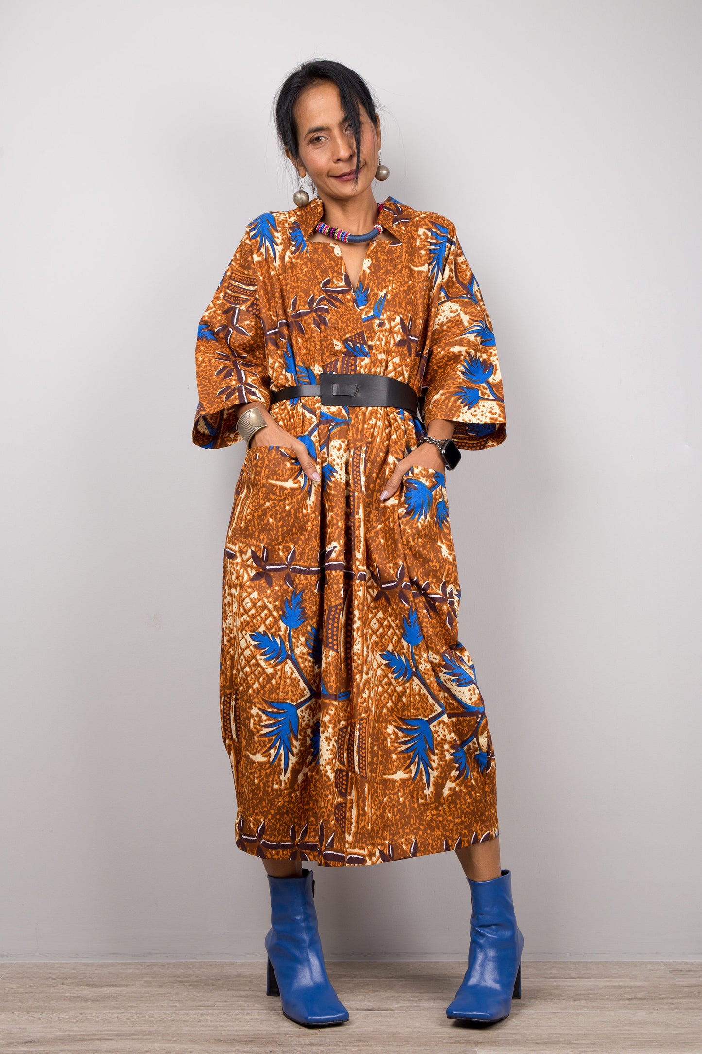 Ankara dress by Nuichan. Clinched at the waist with a black belt.