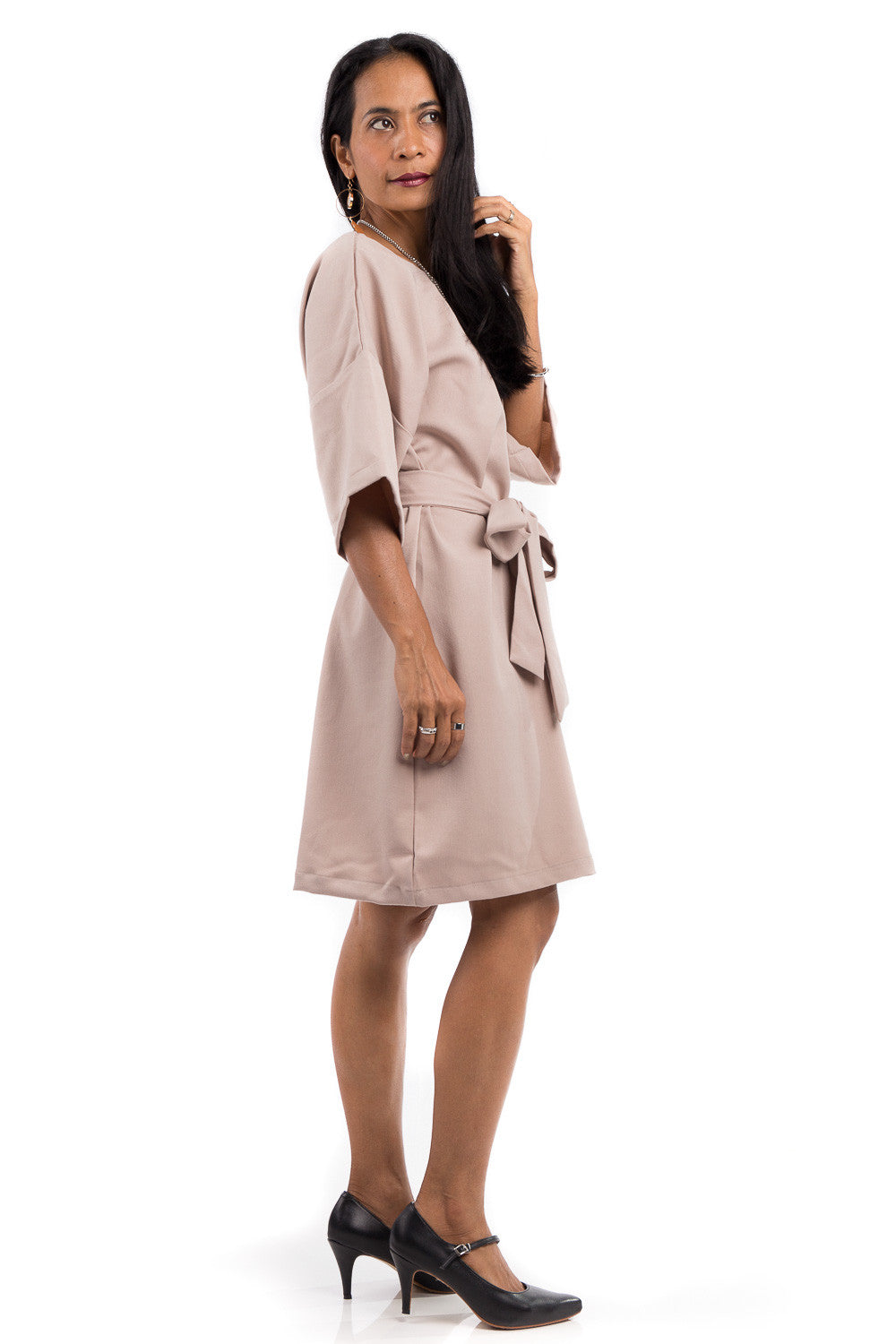 Short summer dress with half length sleeves. Modest neckline with waistband accent. Above the knee length dress.