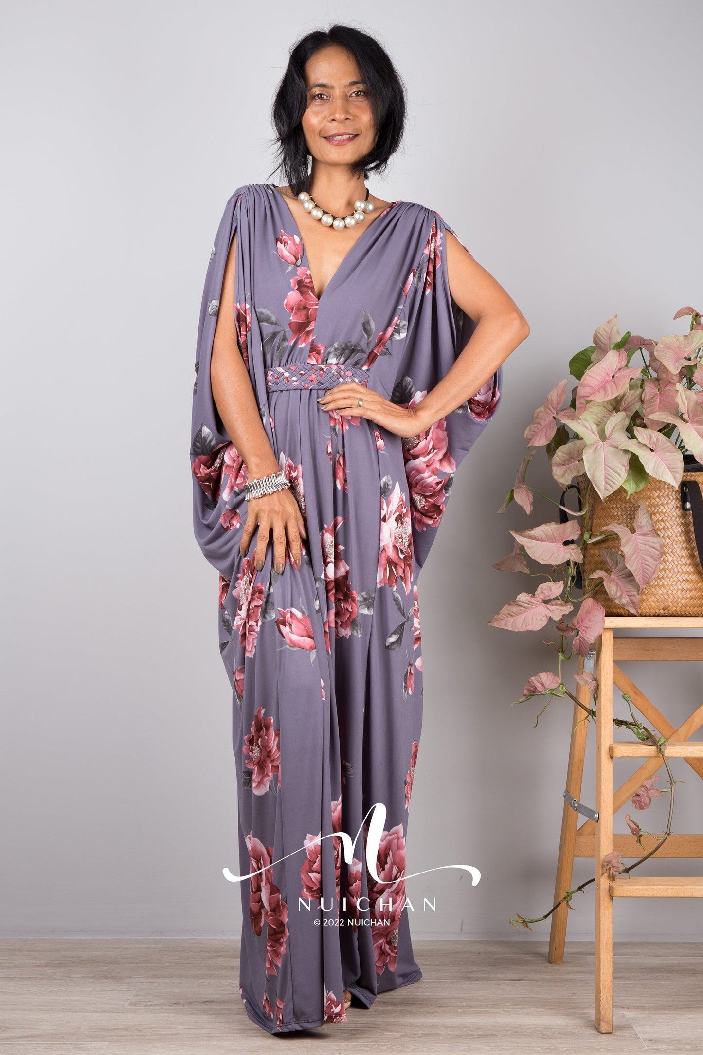 Women wearing floral print dress with plunging neckline