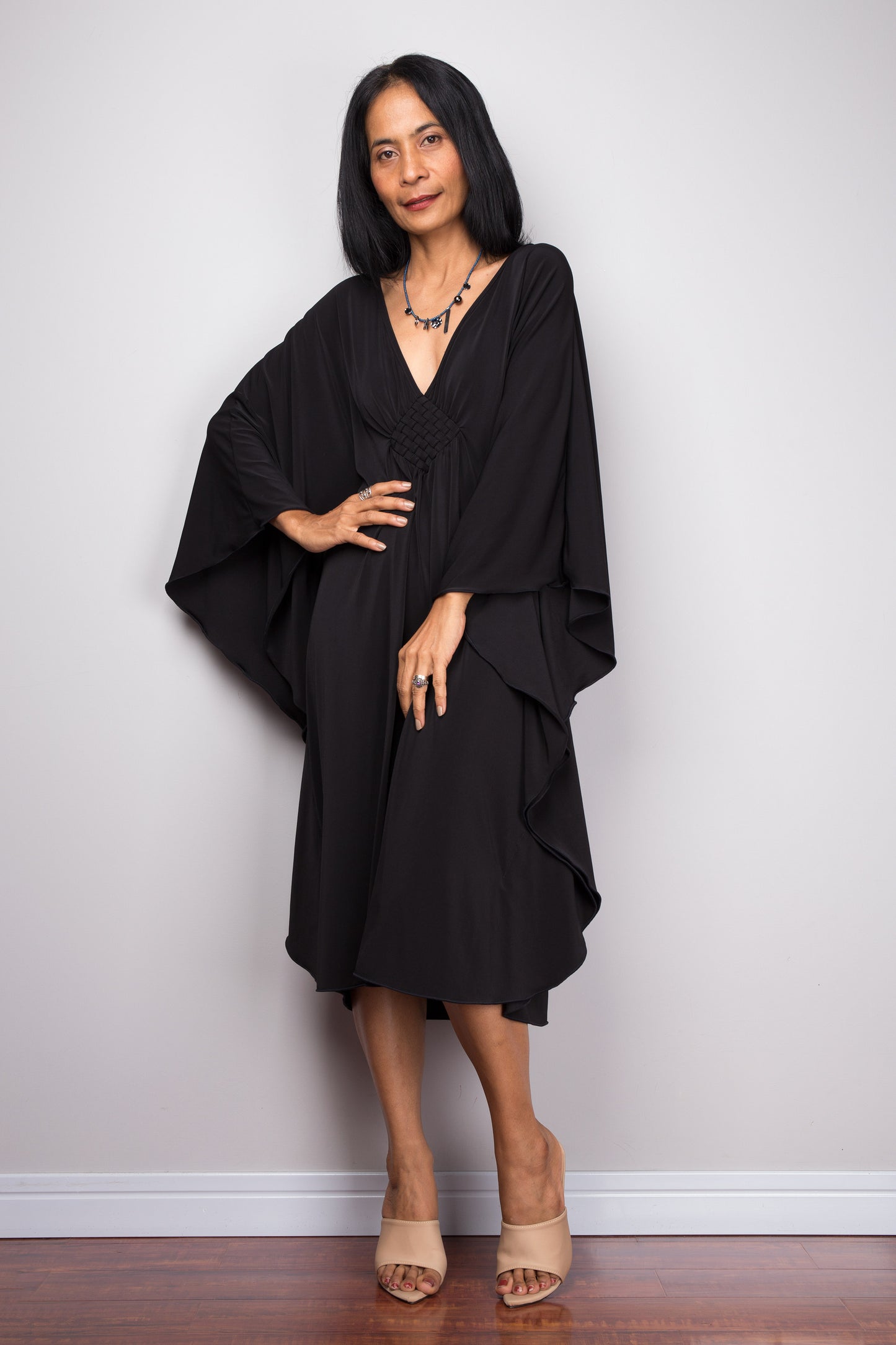 Black midi kaftan dress by Nuichan. Buy short black dress online