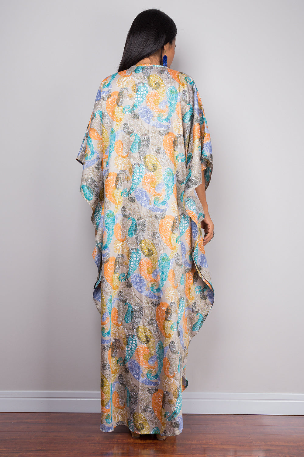 Women wearing a kaftan dress for petite. Paisley print caftan by Nuichan