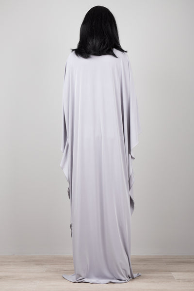 Light grey kaftan dress with plunging neckline.  Diamond shape woven detail just below neckline.  A true classic toga dress by Nuichan