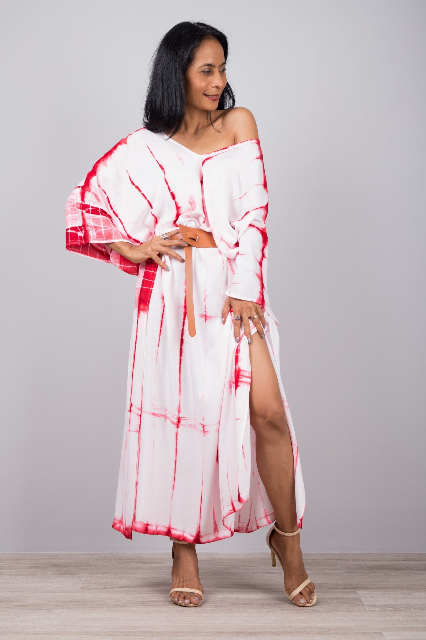 White and red tie dress. Kaftan style. Show here clinched with a belt at the waist.