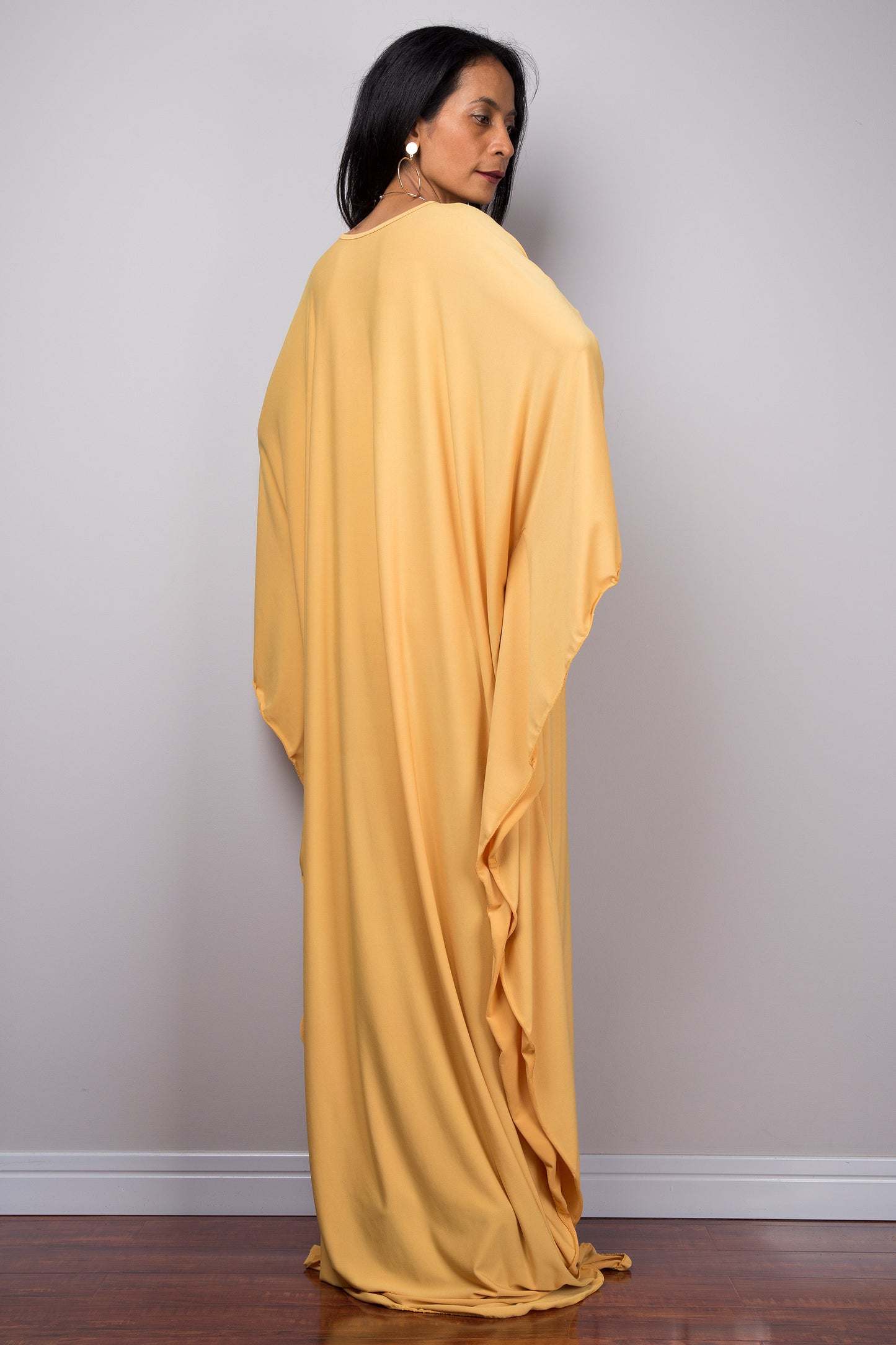 Yellow kaftan dress by Nuichan - back view