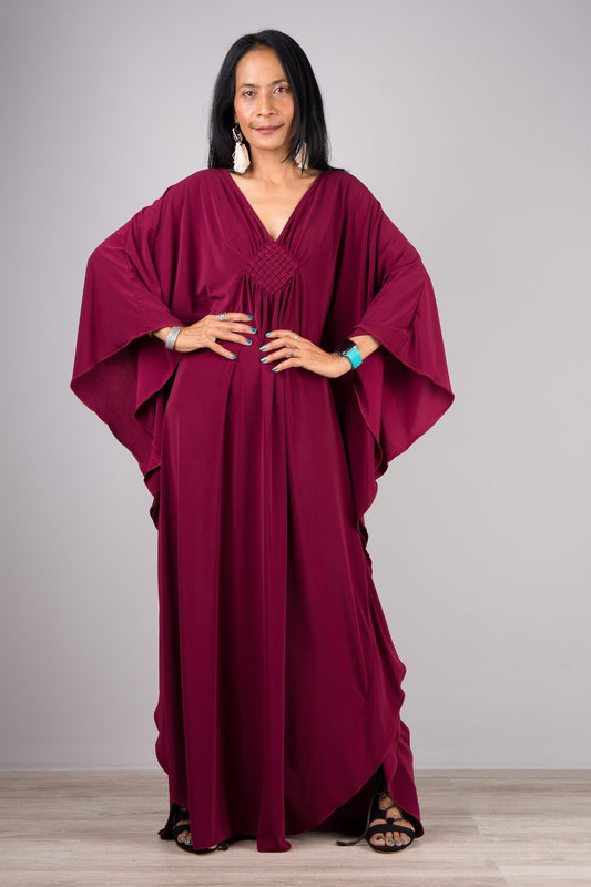 Burgundy kaftan by Nuichan.  In trend with the 2026 Color trends for spring and summer