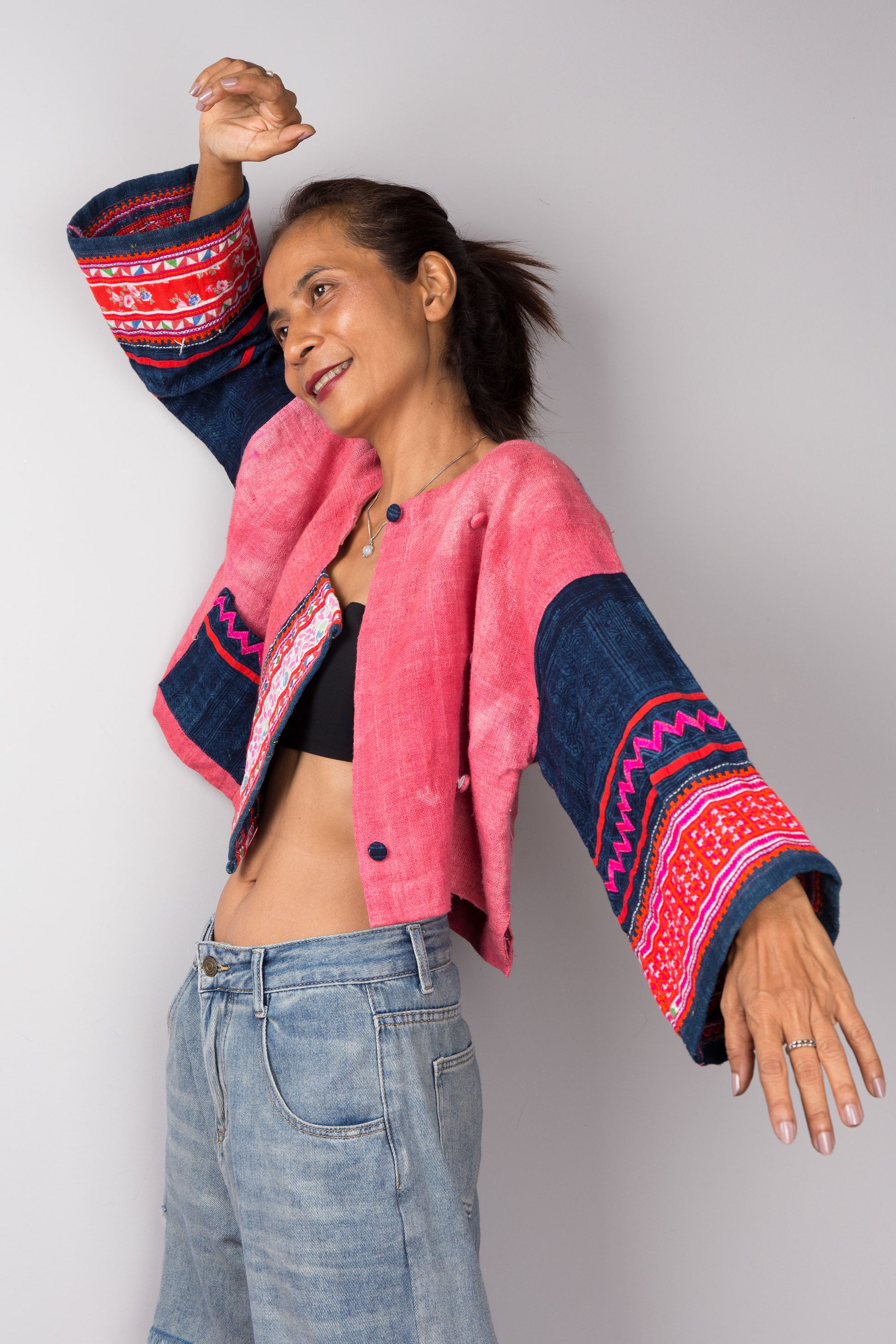 Pink handwoven jacket (unbuttoned view) with hill tribe fabric sleeves