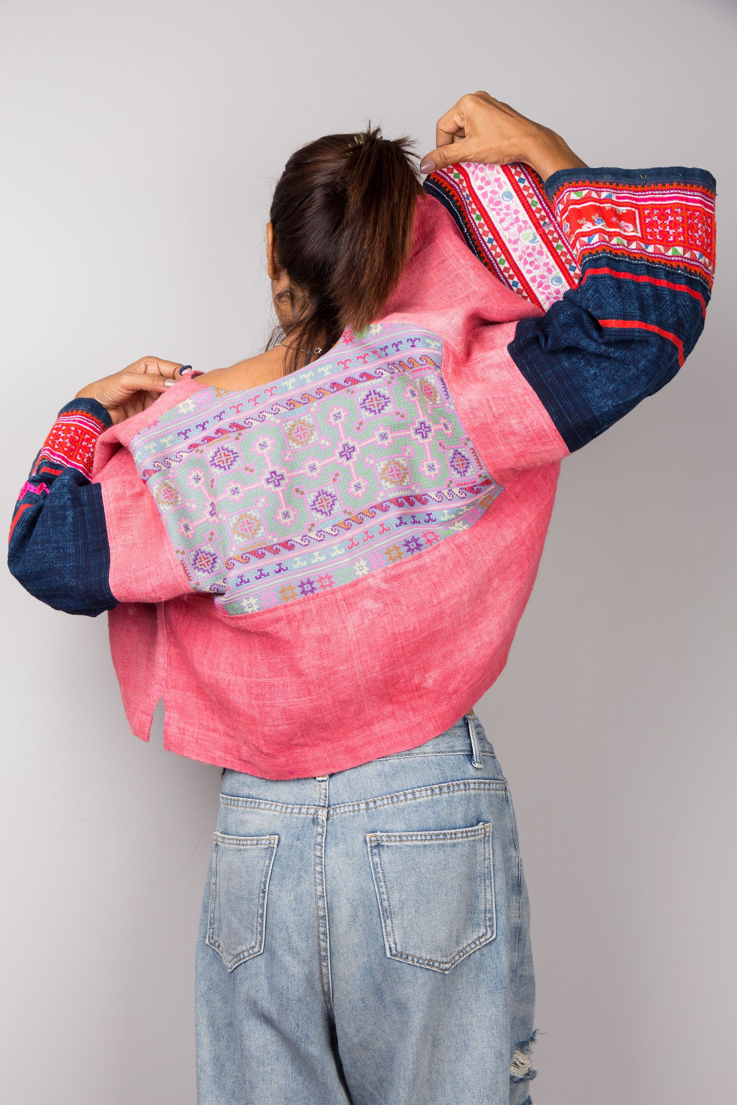 Back view of a pink handwoven hemp jacket by Nuichan