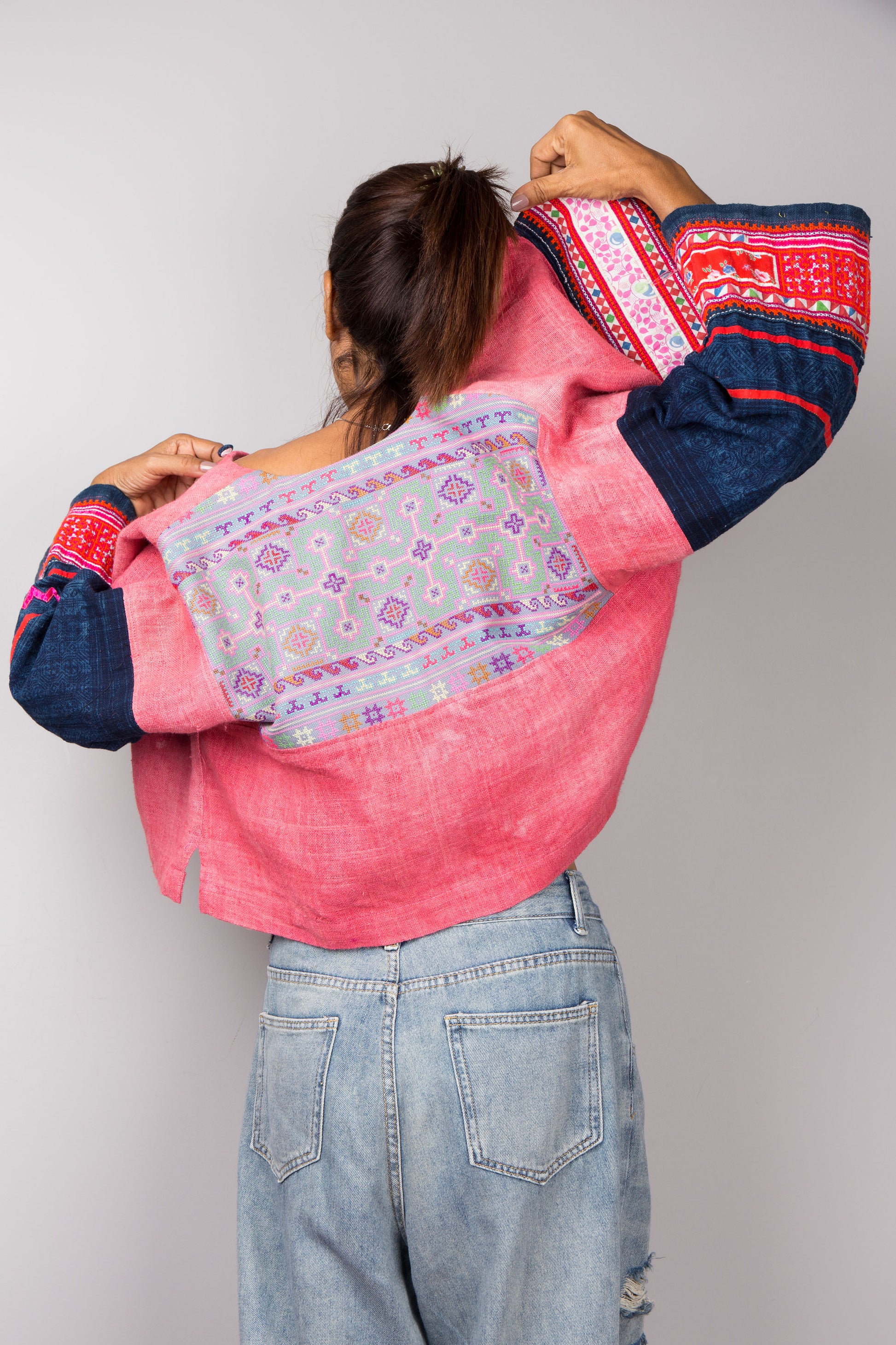 Back view of a pink handwoven hemp jacket by Nuichan