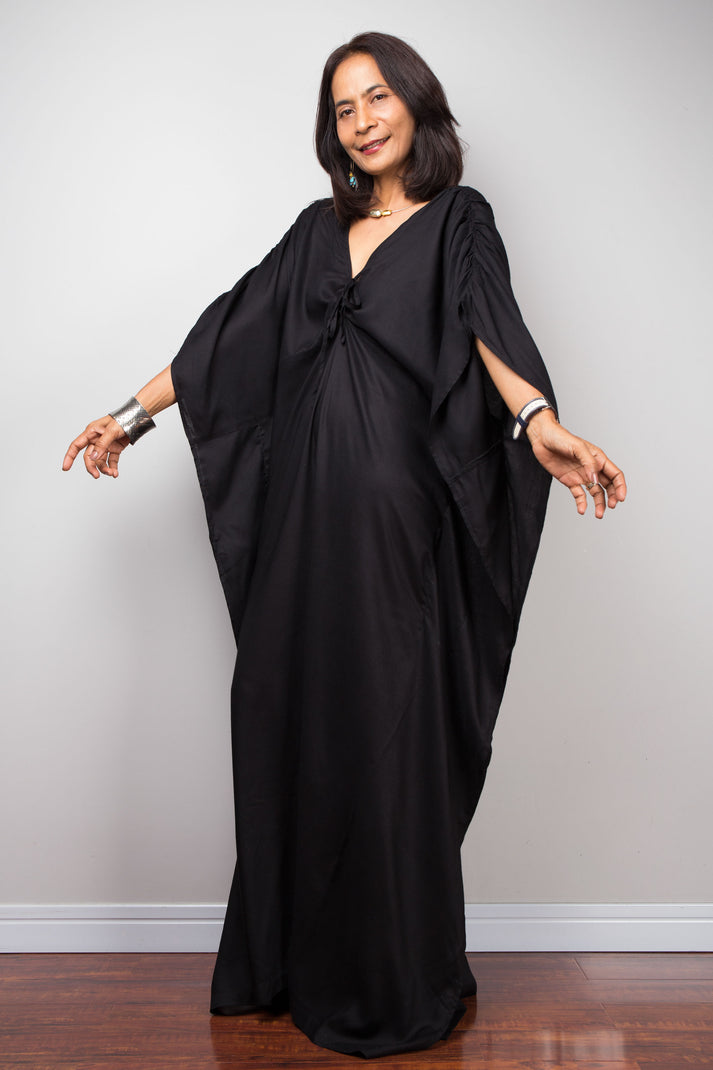 Black caftan dress by Nuichan