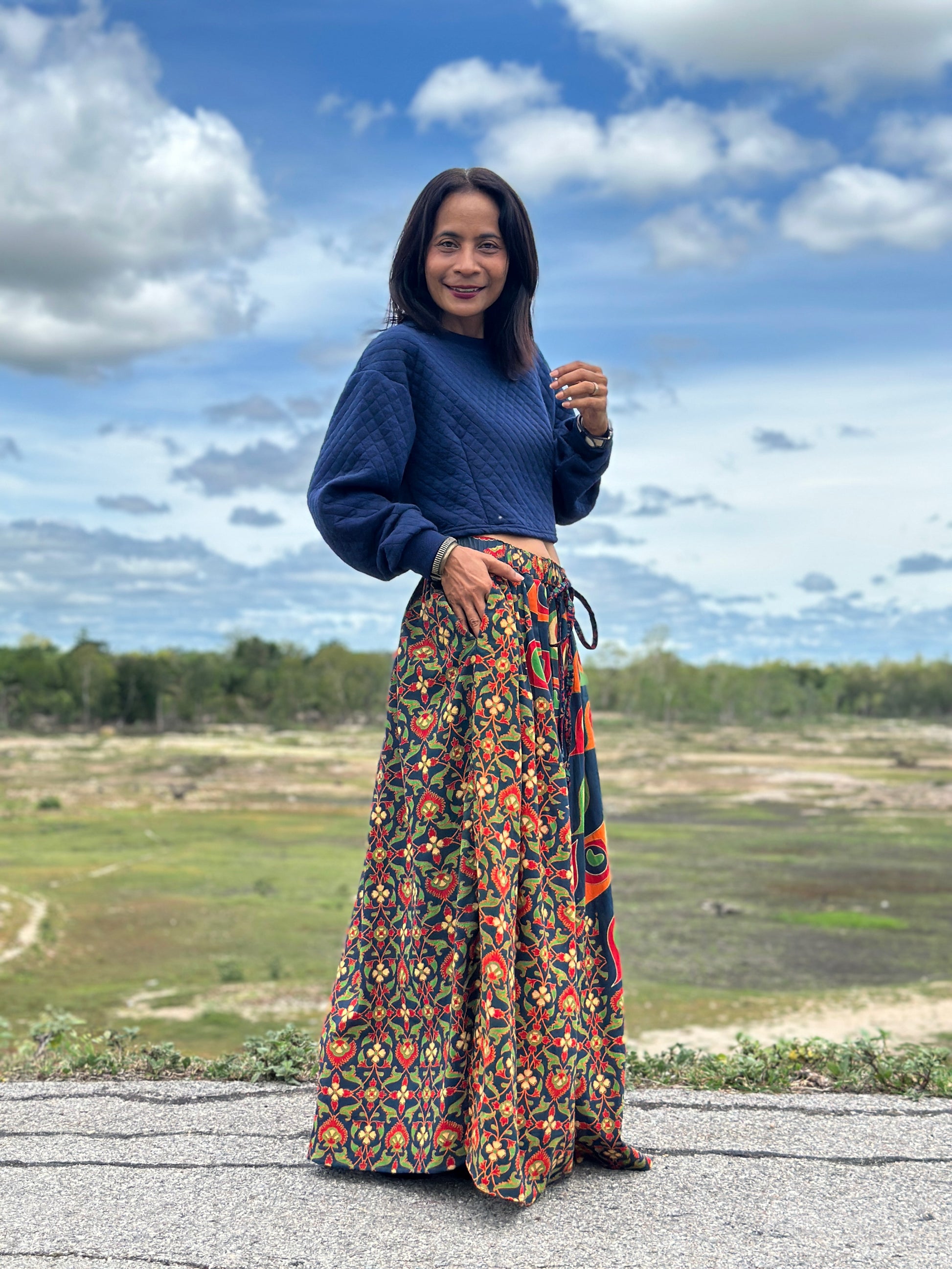 Women’s vibrant mandala maxi skirt, elastic waist, floral design, great for casual or outdoor wear in 2025 fashion. 

