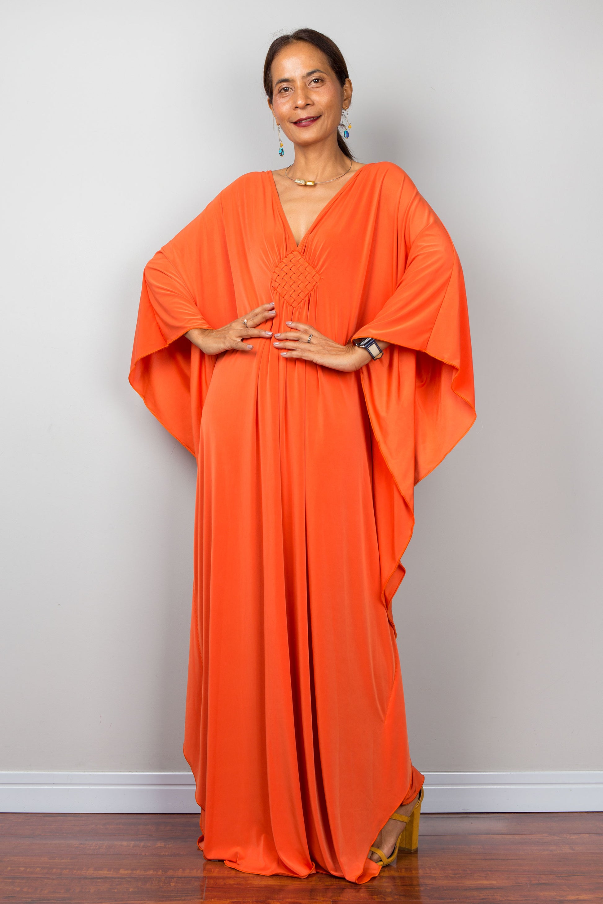 Orange kaftan dress with batwing sleeves and plunging v neckline. Long orange dress by Nuichan