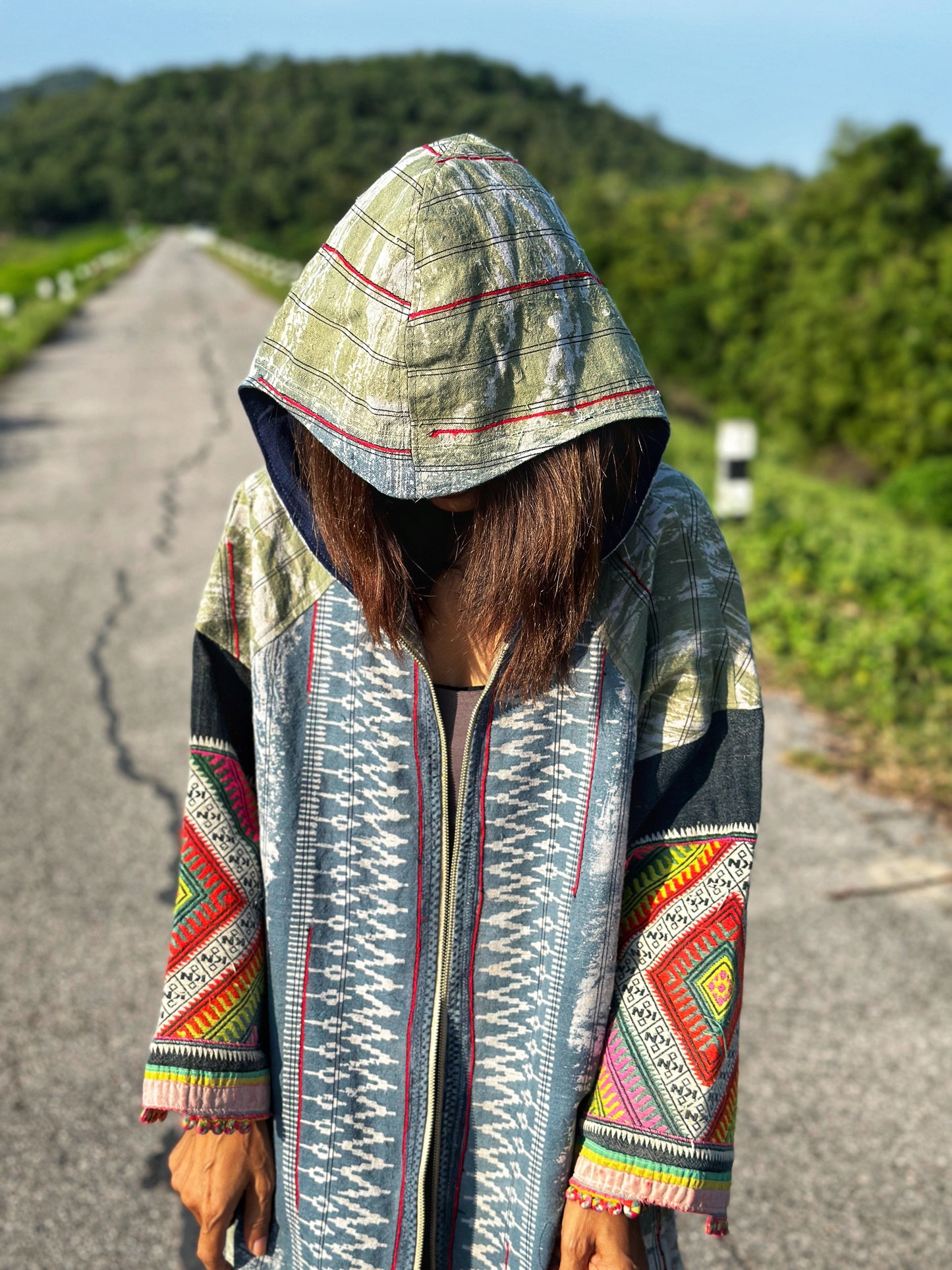 Patchwork hill tribe jacket with embroidery on the sleeves.  Handwoven hemp jacket with batik tie dye
