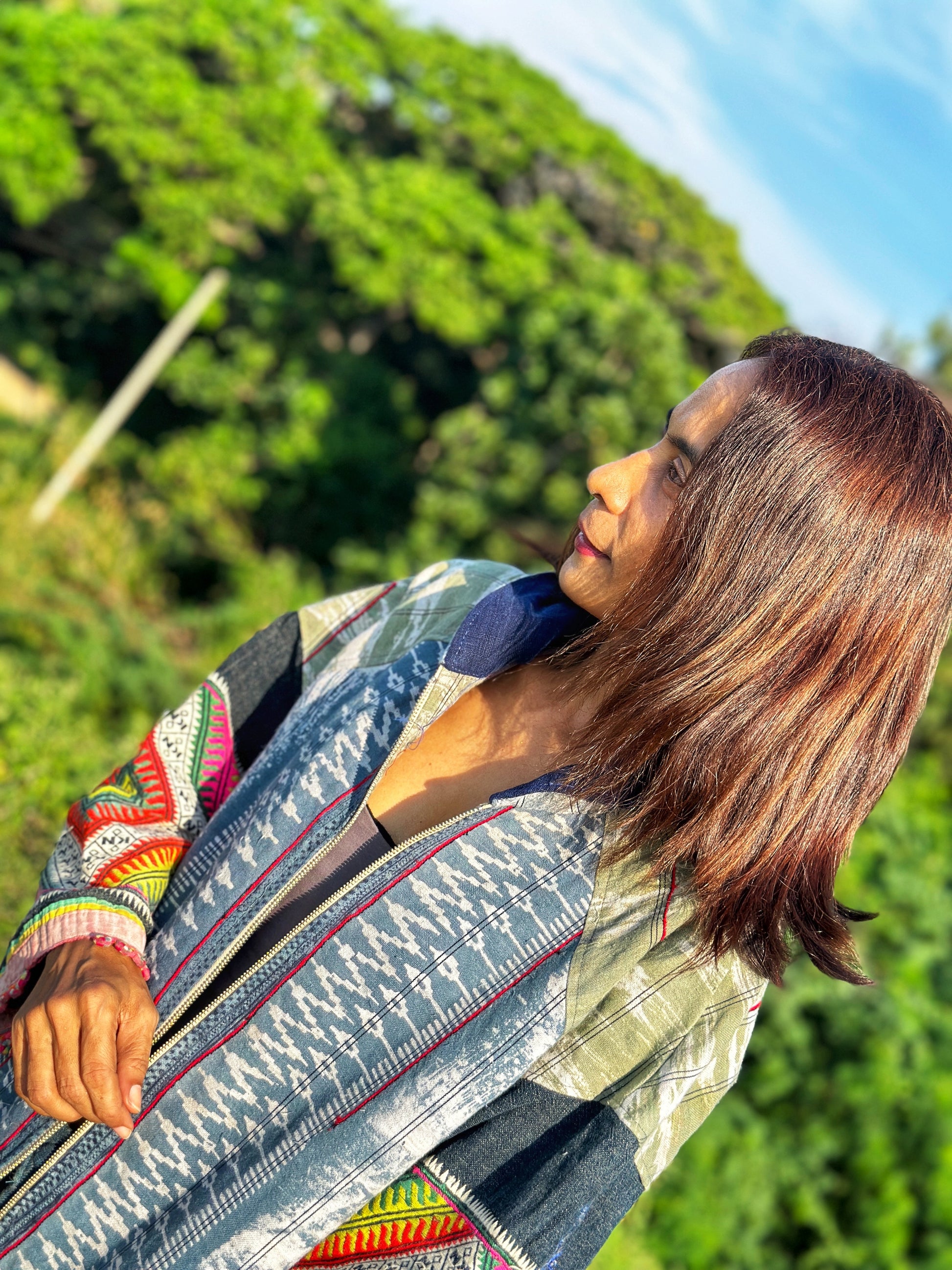 Patchwork hooded jacket with embroidery on the sleeves.  Handwoven hemp jacket with batik tie dye
