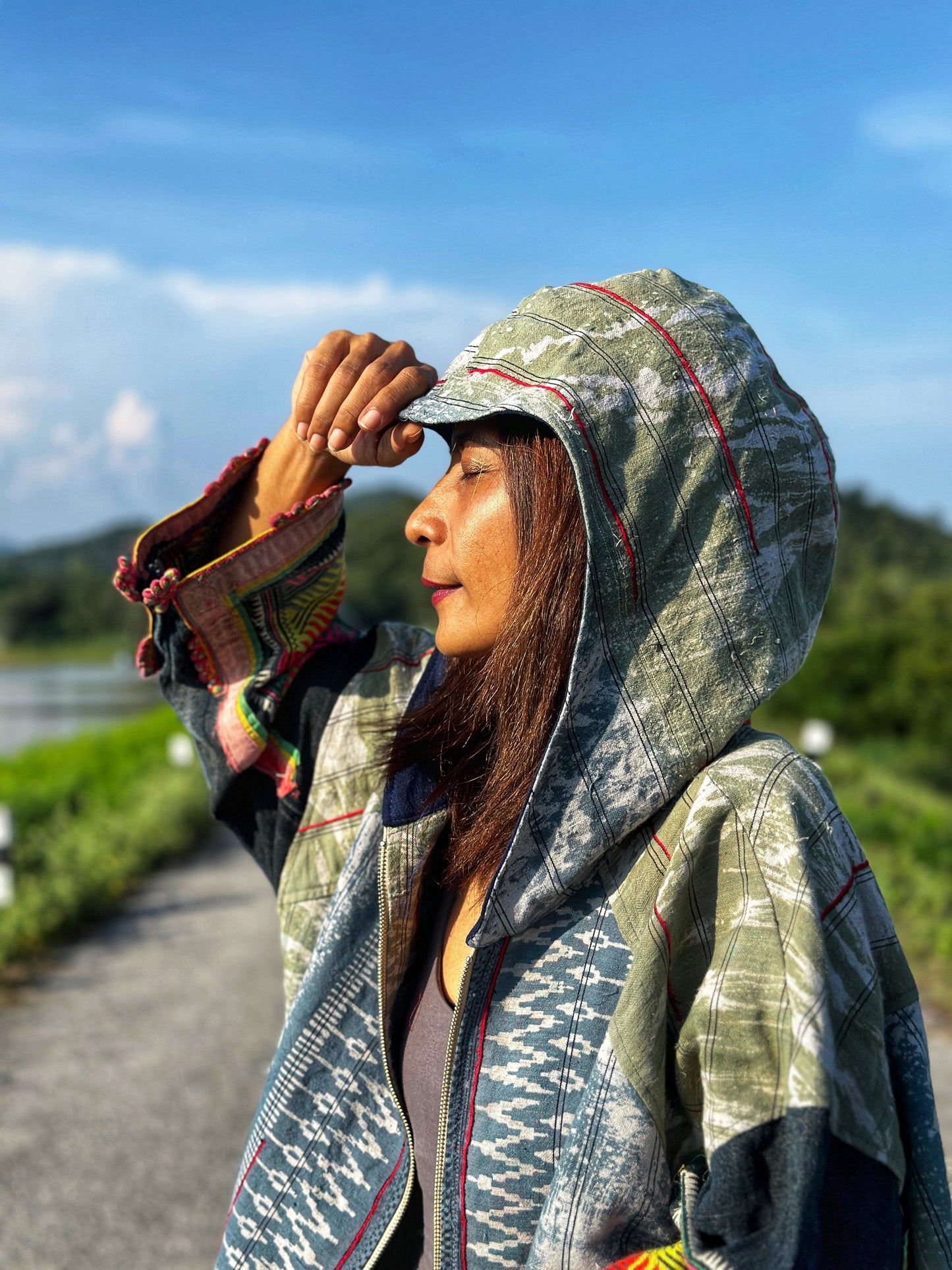 Patchwork hooded jacket with embroidery on the sleeves by Nuichan.  Handwoven hemp jacket with batik tie dye
