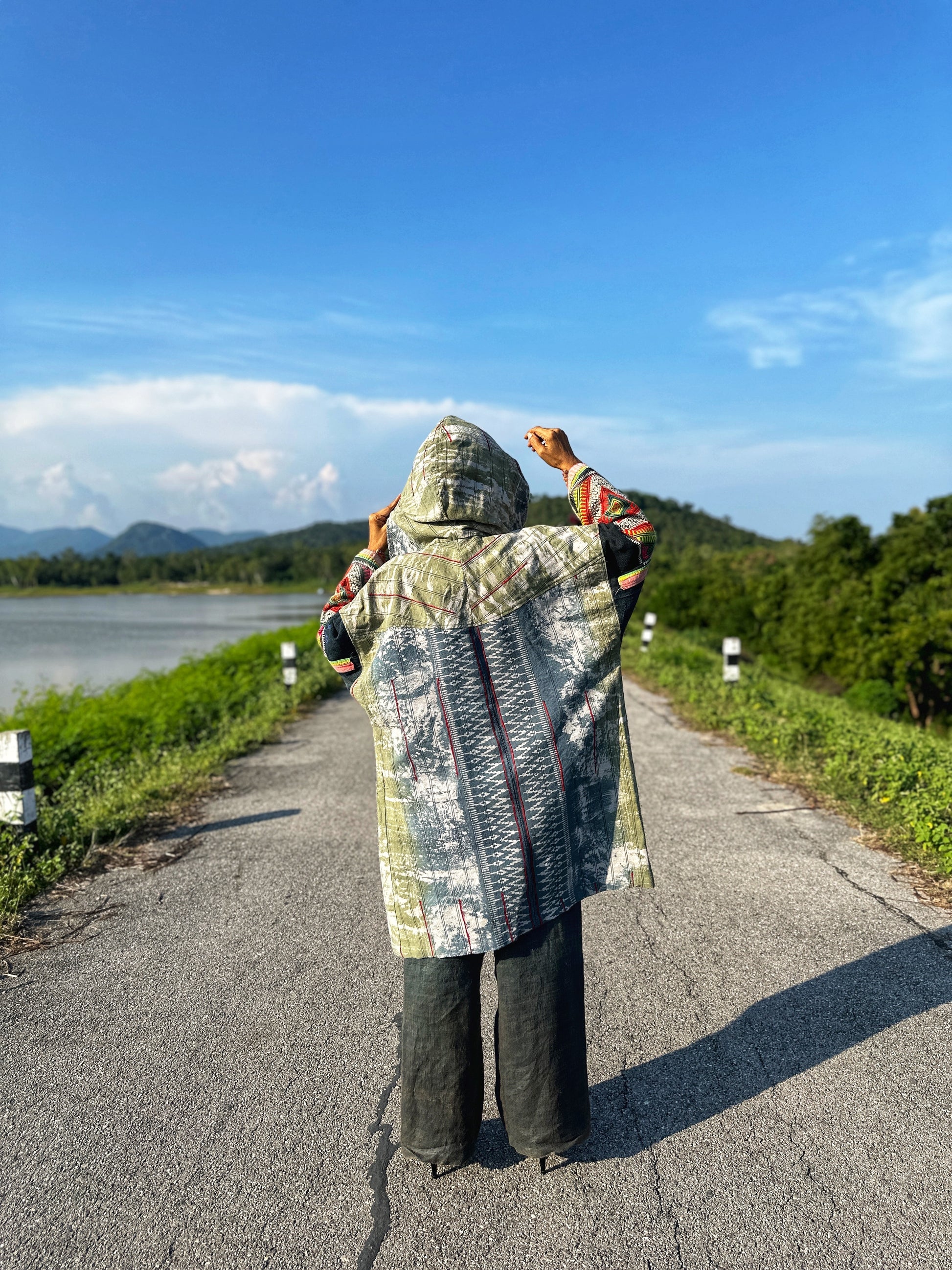Patchwork hooded jacket with hill tribe embroidery on the sleeves.  Handwoven hemp jacket with batik tie dye
