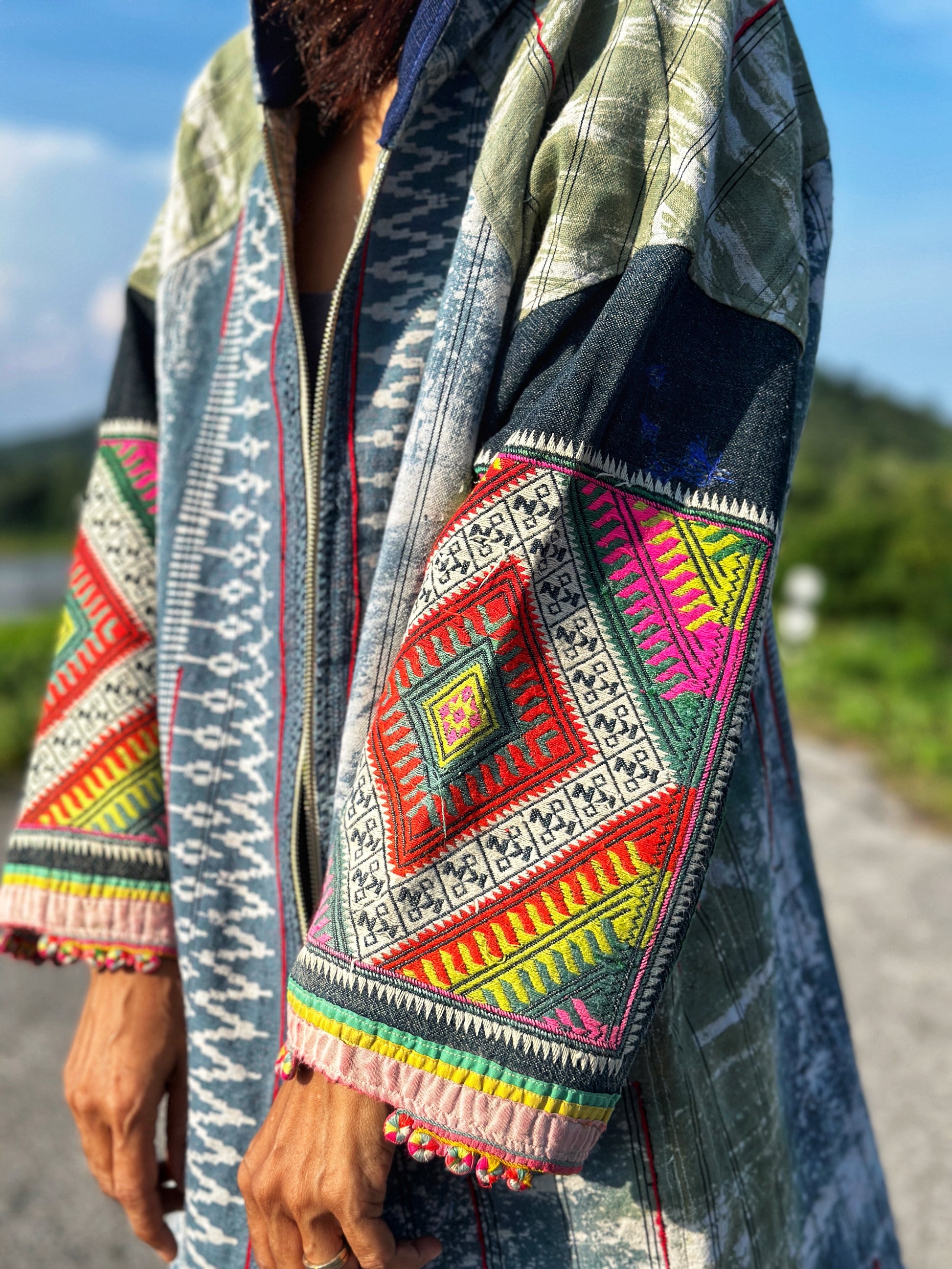 Patchwork hooded jacket with embroidery on the sleeves.  Handwoven hill tribe hemp jacket with batik tie dye
