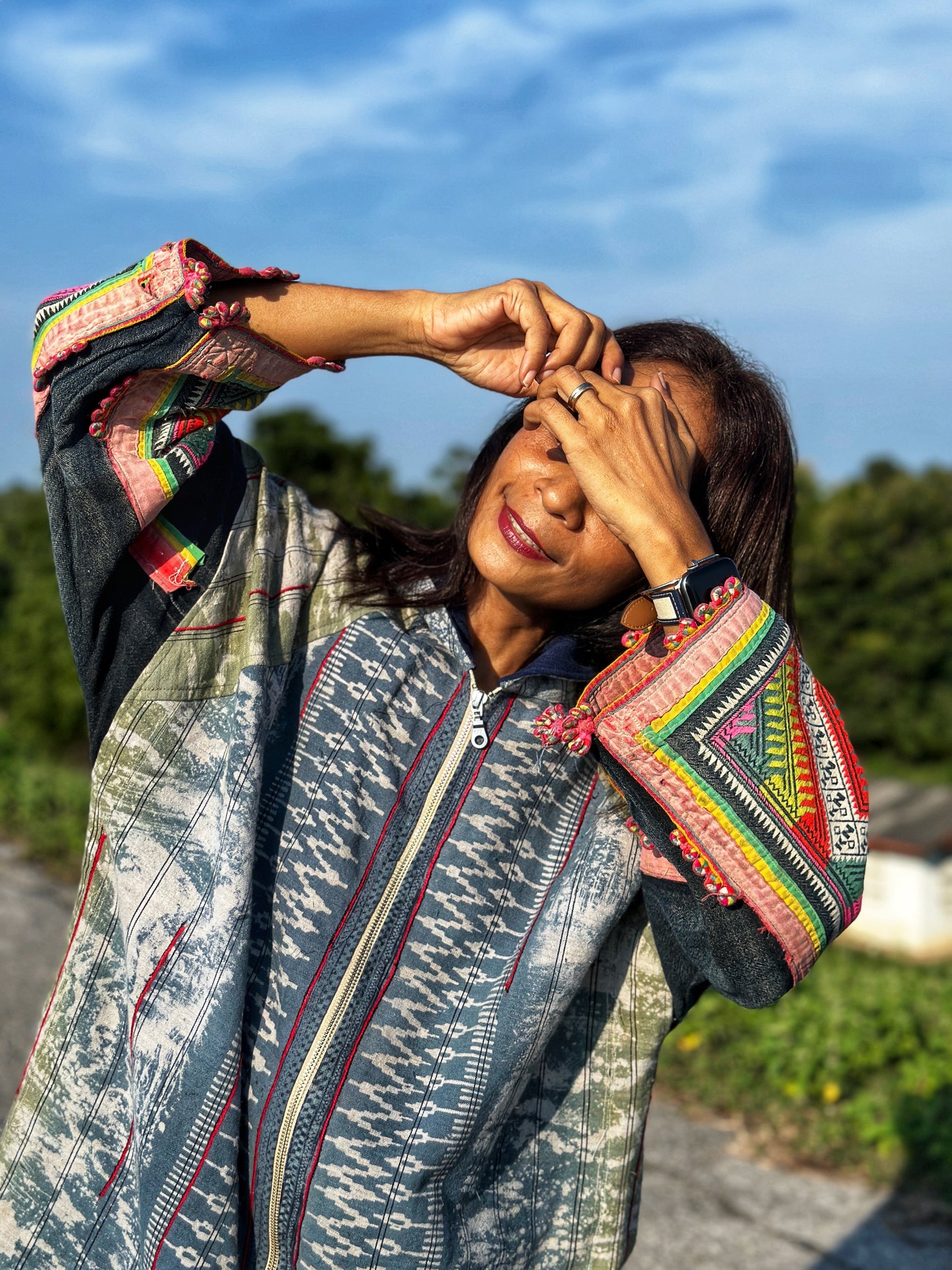 Patchwork hooded jacket with embroidery on the sleeves.  Hill Tribe hemp jacket with batik tie dye
