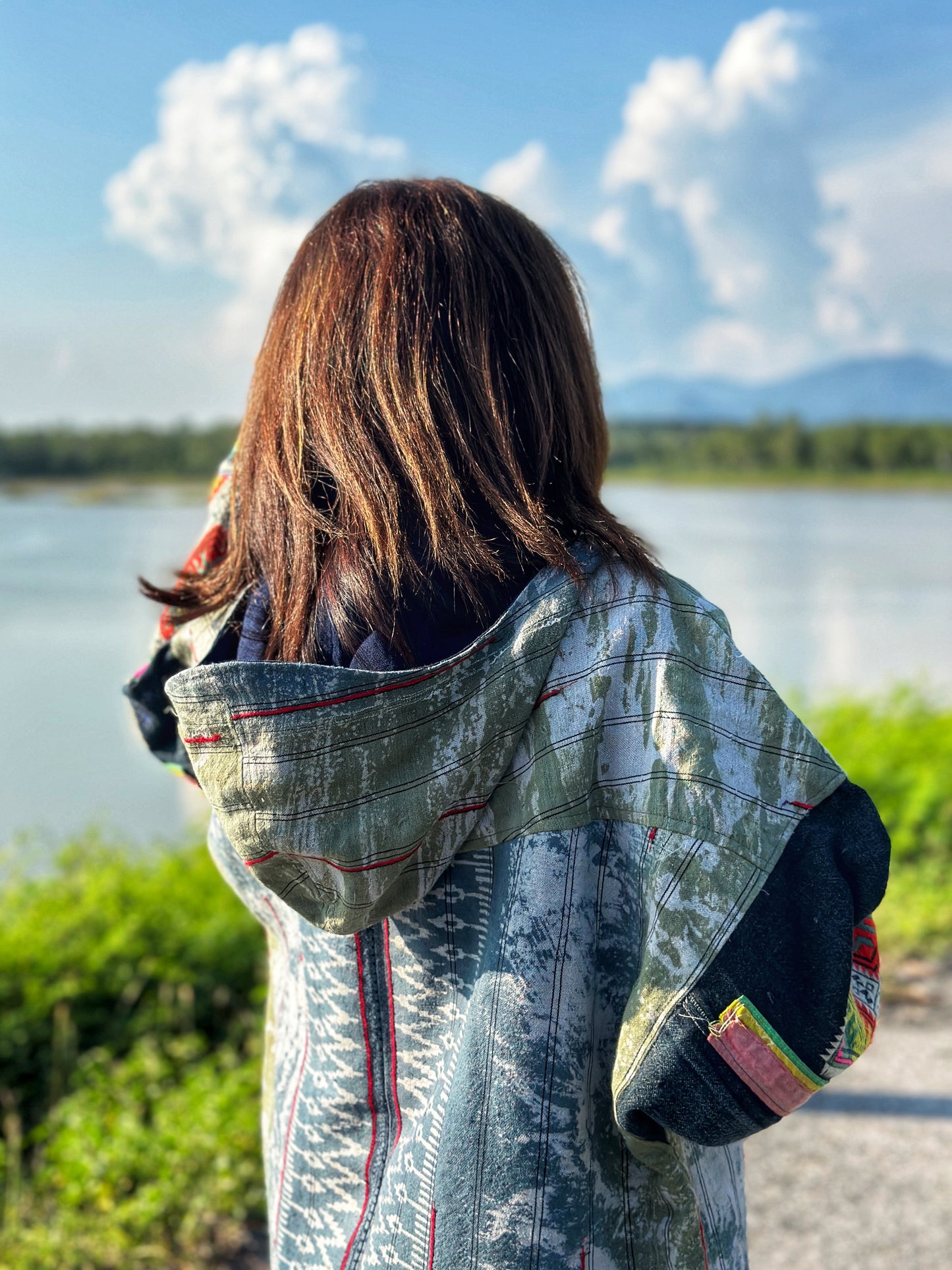 Patchwork hooded jacket with hill tribe embroidery on the sleeves.  Handwoven hemp jacket with batik tie dye by Nuichan
