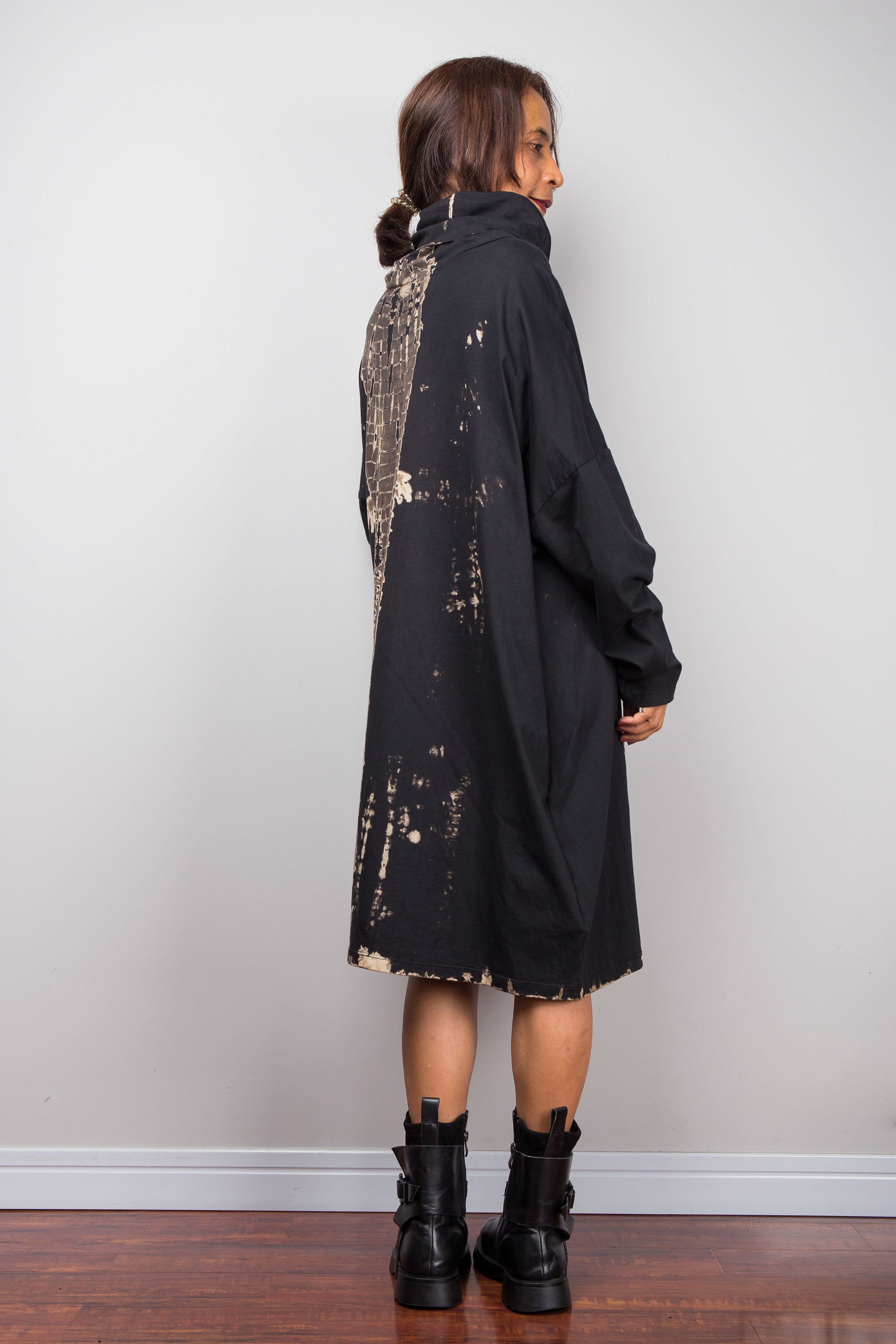 Oversized Nuichan reverse tie dye tunic dress featuring a funnel neck and vertical abstract sand and black patterns. Back view