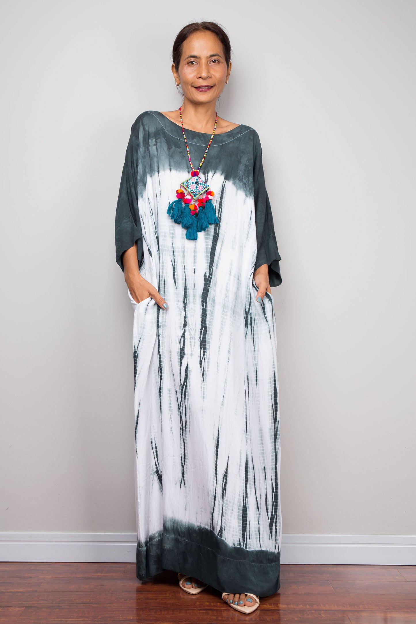 Front full-length view of the relaxed fit rayon spandex Shibori tie dye summer dress by Nuichan, displaying its fluid drape and classic boat neckline.