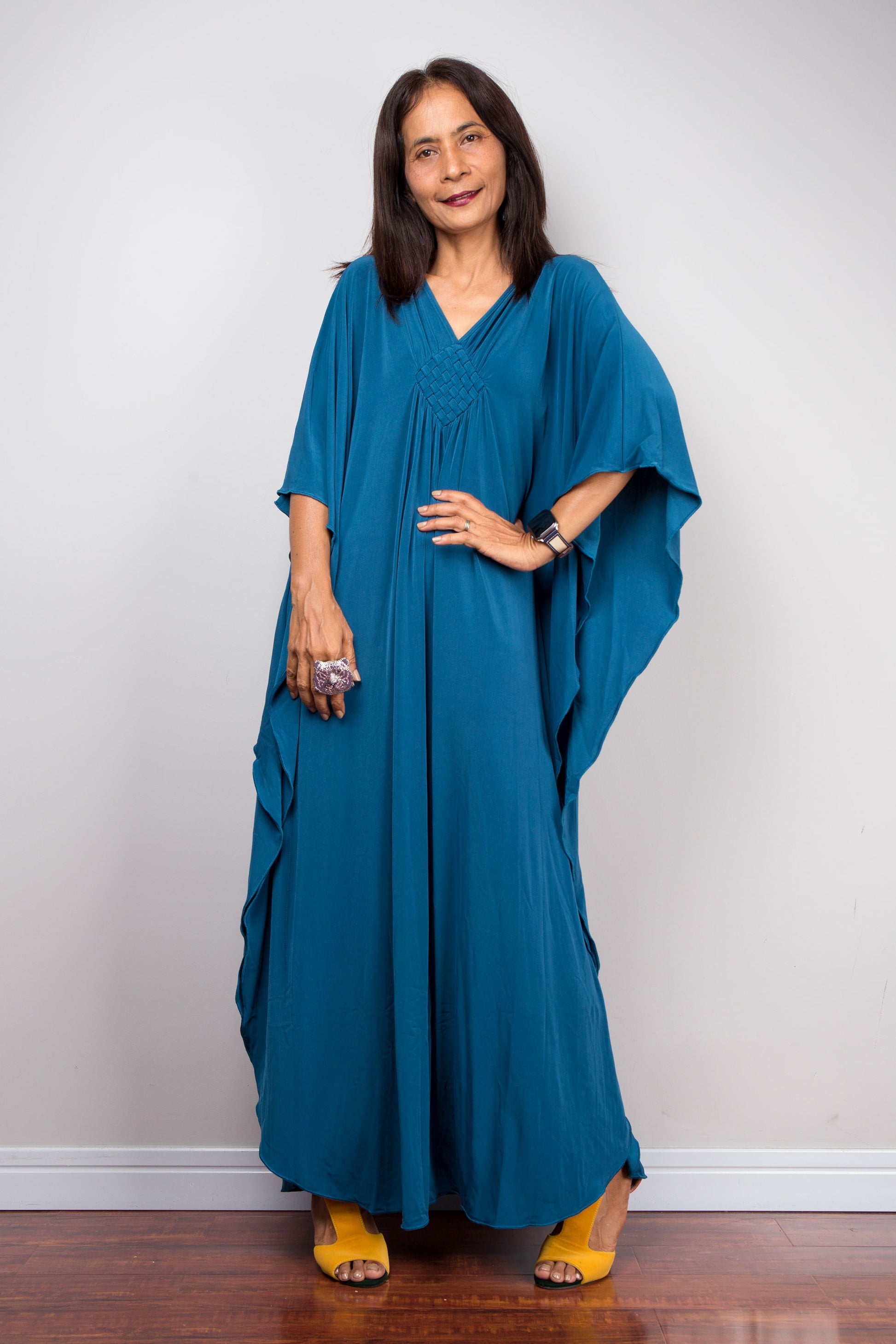 Small Teal Caftan for Petite Beachwear
Short teal kaftan for petite women, blending boho charm with summer practicality. Made from breezy polyester-spandex, this small caftan is a perfect beach cover-up or casual dress for warm days.  