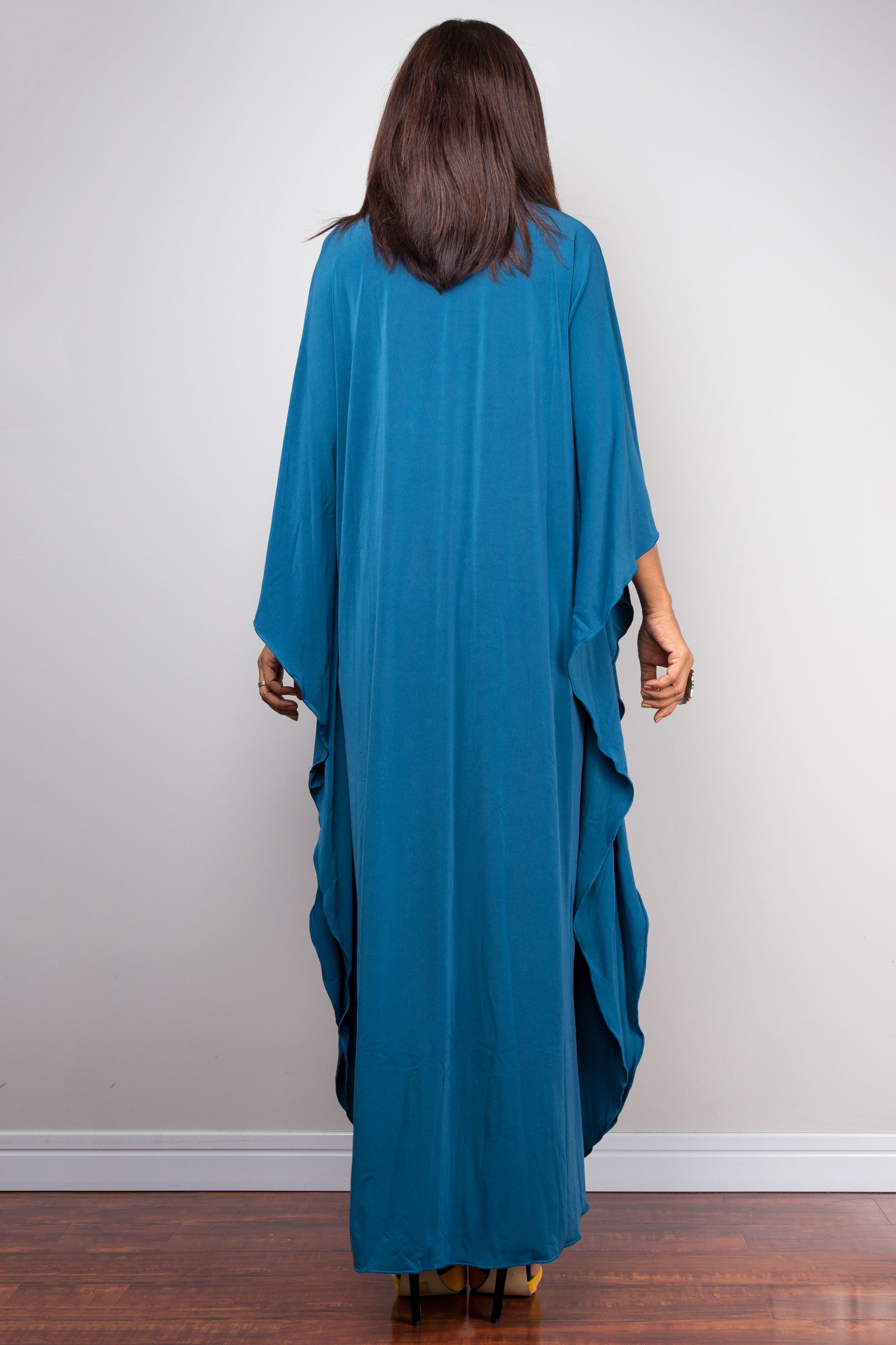 Teal Short Kaftan for Petite Summer Fashion
Elegant teal kaftan dress for petite women, offering a short, flowy fit for summer. Handmade with soft polyester-spandex, this boho caftan is perfect for small frames seeking beach or casual style.  
