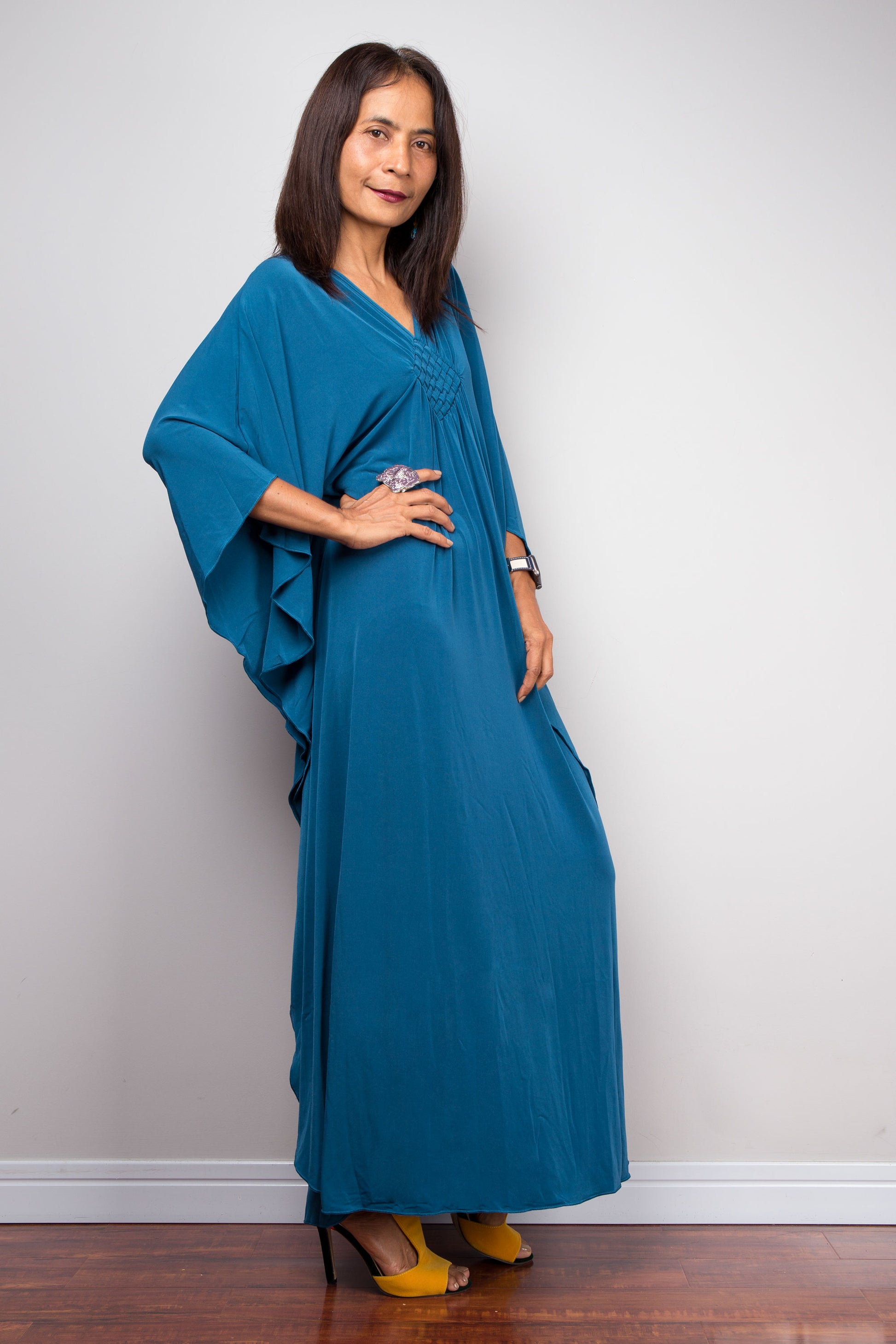 Petite Teal Summer Kaftan for Small Sizes
Vibrant teal short kaftan for petite women, offering a breezy boho look. Crafted from soft, stretchy fabric, this small caftan is perfect for summer beach trips or casual outings, tailored for petite frames.