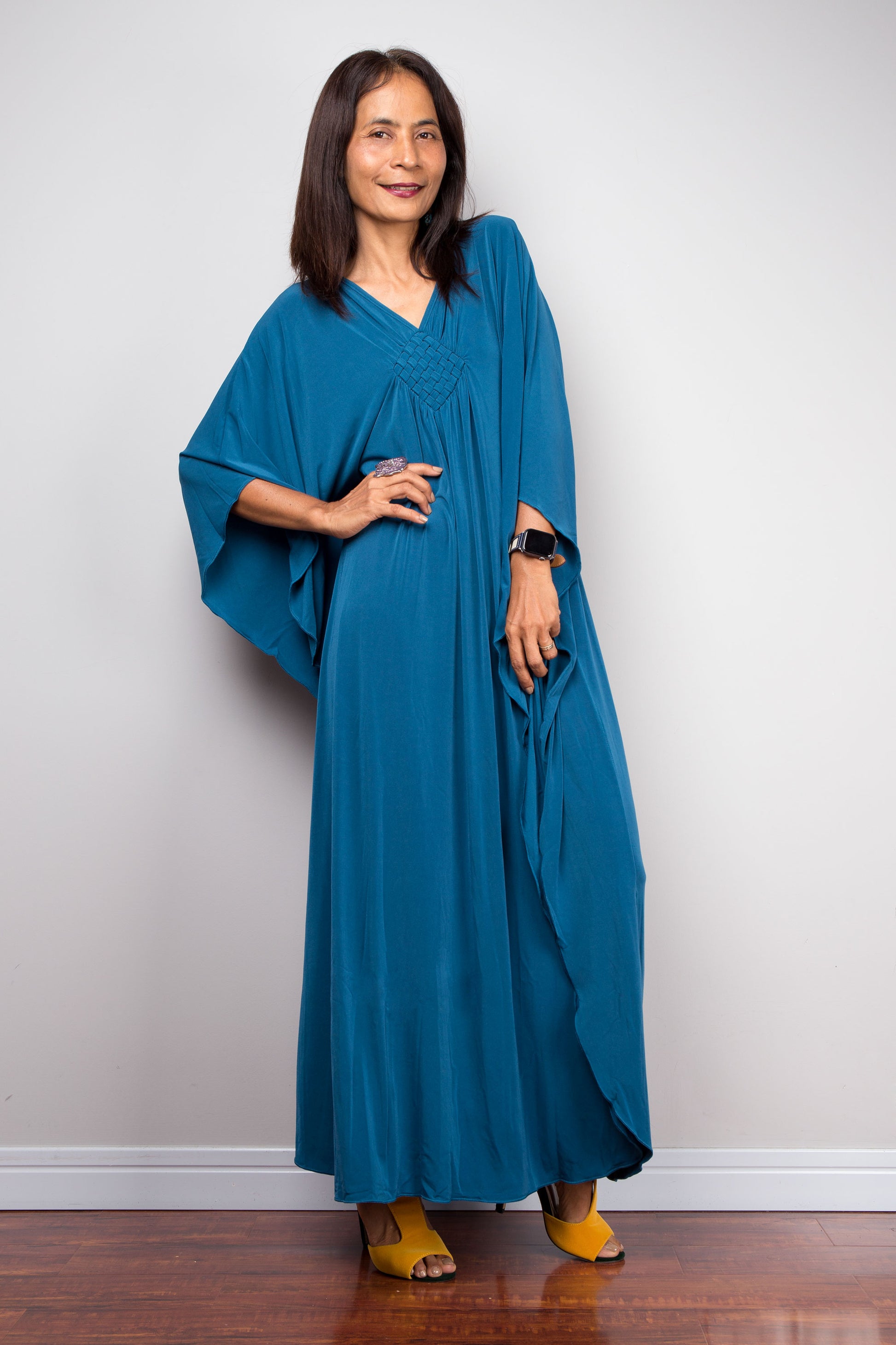 Boho Teal Kaftan for Petite Women’s Beachwear
Short teal kaftan designed for petite women, combining boho flair with summer comfort. This lightweight, small caftan in rich teal is ideal as a beach cover-up or relaxed dress for warm weather. 