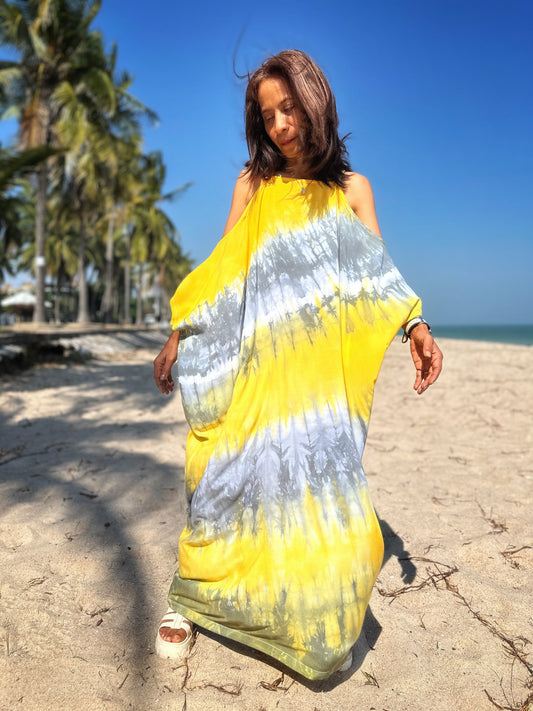 Shibori tie dye kaftan dress with cold shoulders.  Unique yellow and grey tie dye caftan by Nuichan