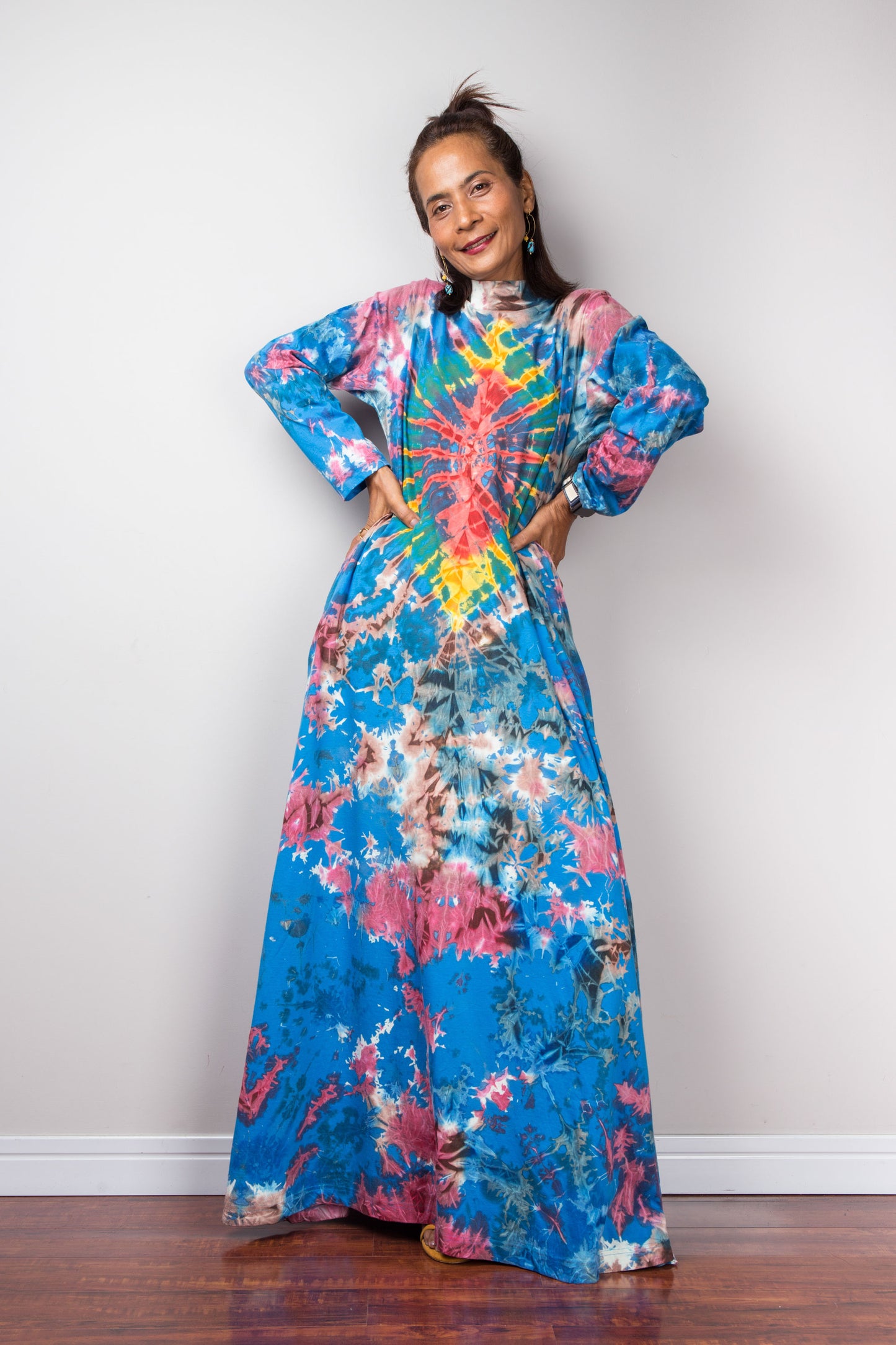Tie dye maxi dress with long sleeves, inseam pockets and short mock turtle neck