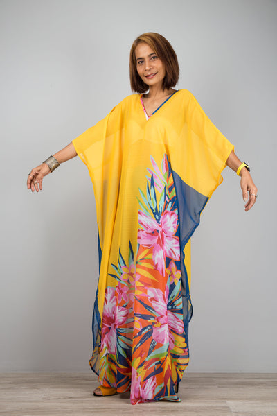 Yellow chiffon kaftan maxi dress with v neck.  See through beach dress with big floral print on the side. Design by Nuichan\