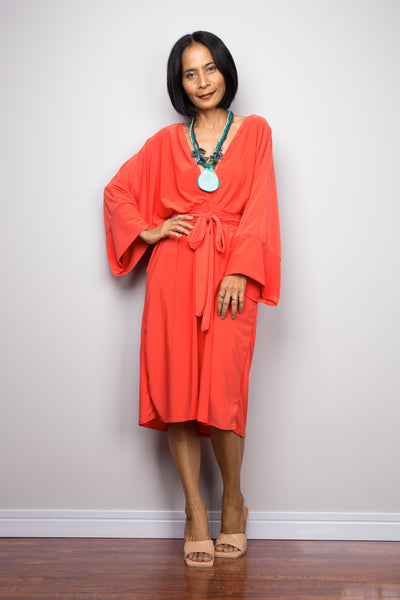 Buy stylish short dress online.  Off shoulder dress by Nuichan  Long sleeve orange dress with pockets
