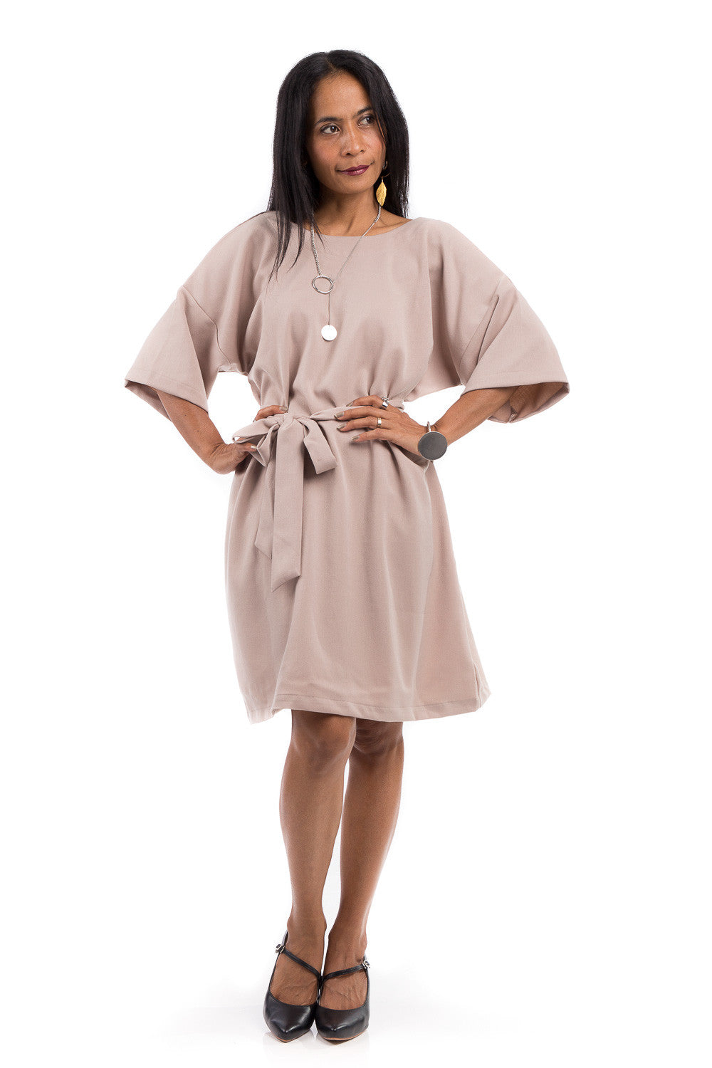 Short summer dress with half length sleeves.  Modest neckline with waistband accent.  Above the knee length dress.