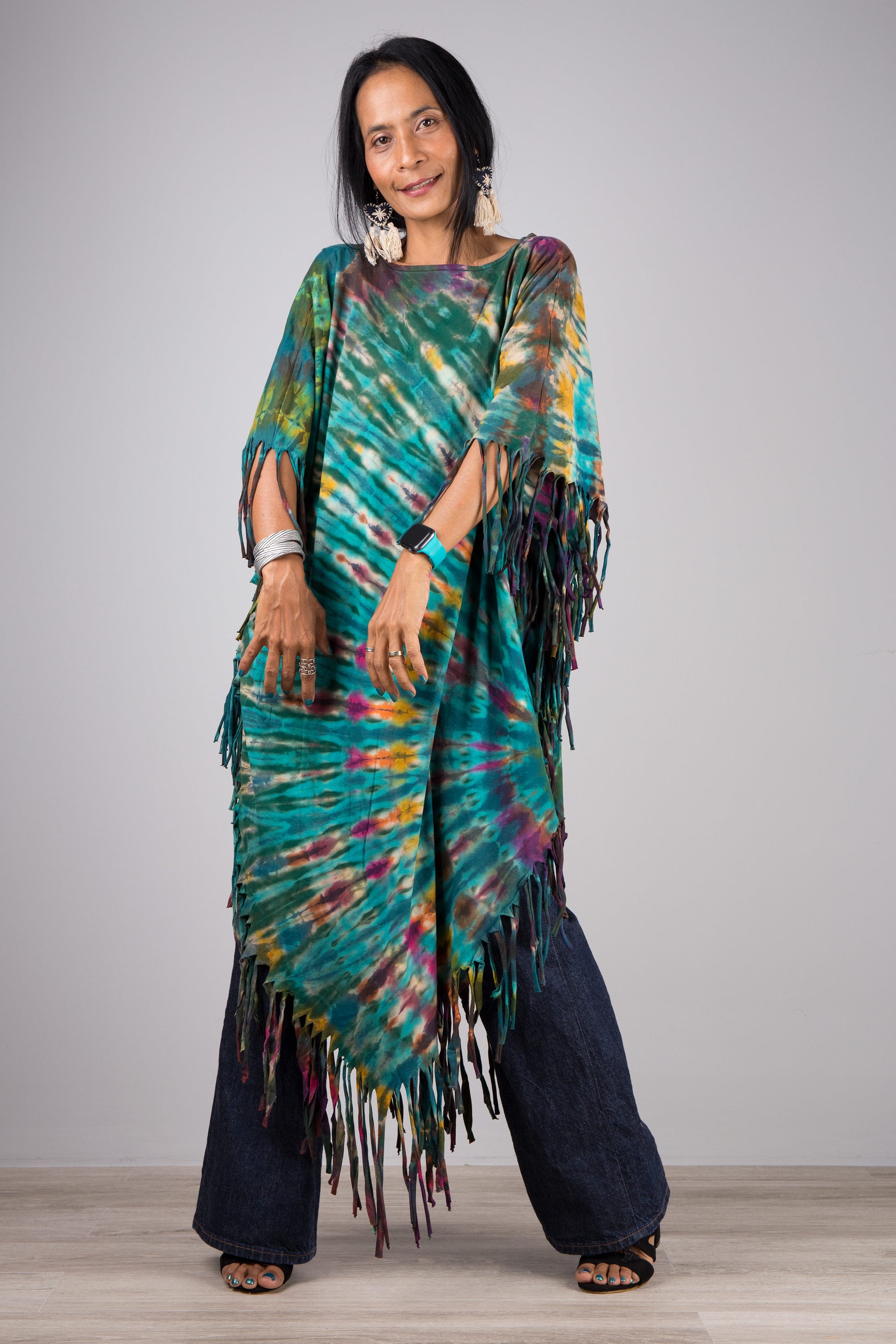 Buy trendy tie dye ponchos online at Nuichan. Check out our selection of tops, crop kaftans, skirts and pants