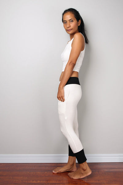 off-white legging pants with black cuffs on the bottom, off-white yoga pants by Nuichan
