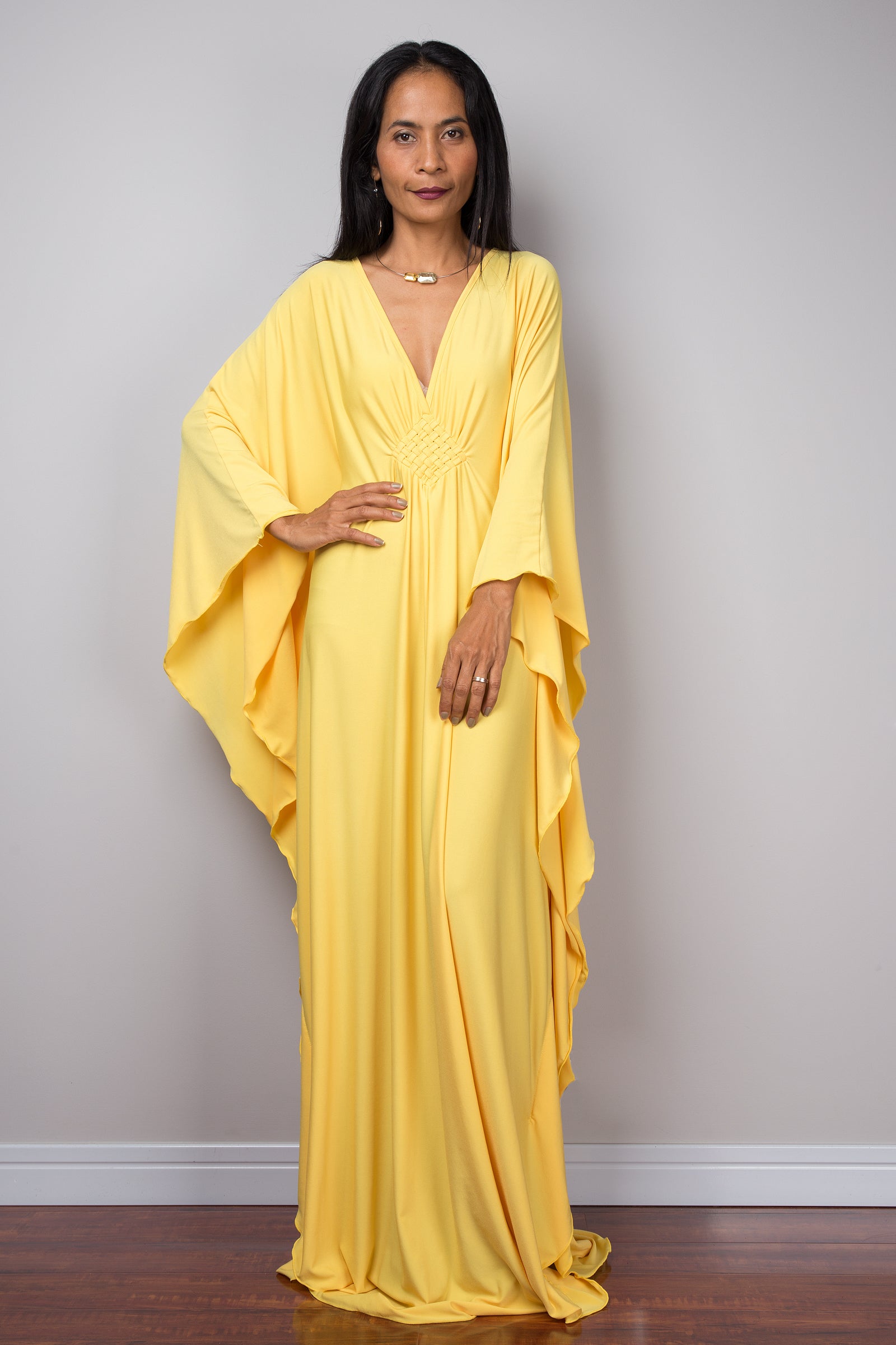 Yellow kaftan dress.  Large loose fit dress with plunging neckline in a soft yellow solid fabric.  A wide sleeve oversized maxi dress by Nuichan.