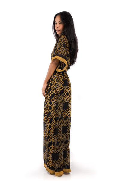 Boho summer dress.  Chiffon maxi dress with plunging neck line on front and back.  Golden yellow print on black fabric.  Smocked waist to ensure good fit.  Kimono inspired dress by Nuichan