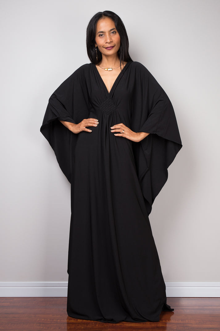 Black kaftan dress with batwing sleeves by Nuichan
