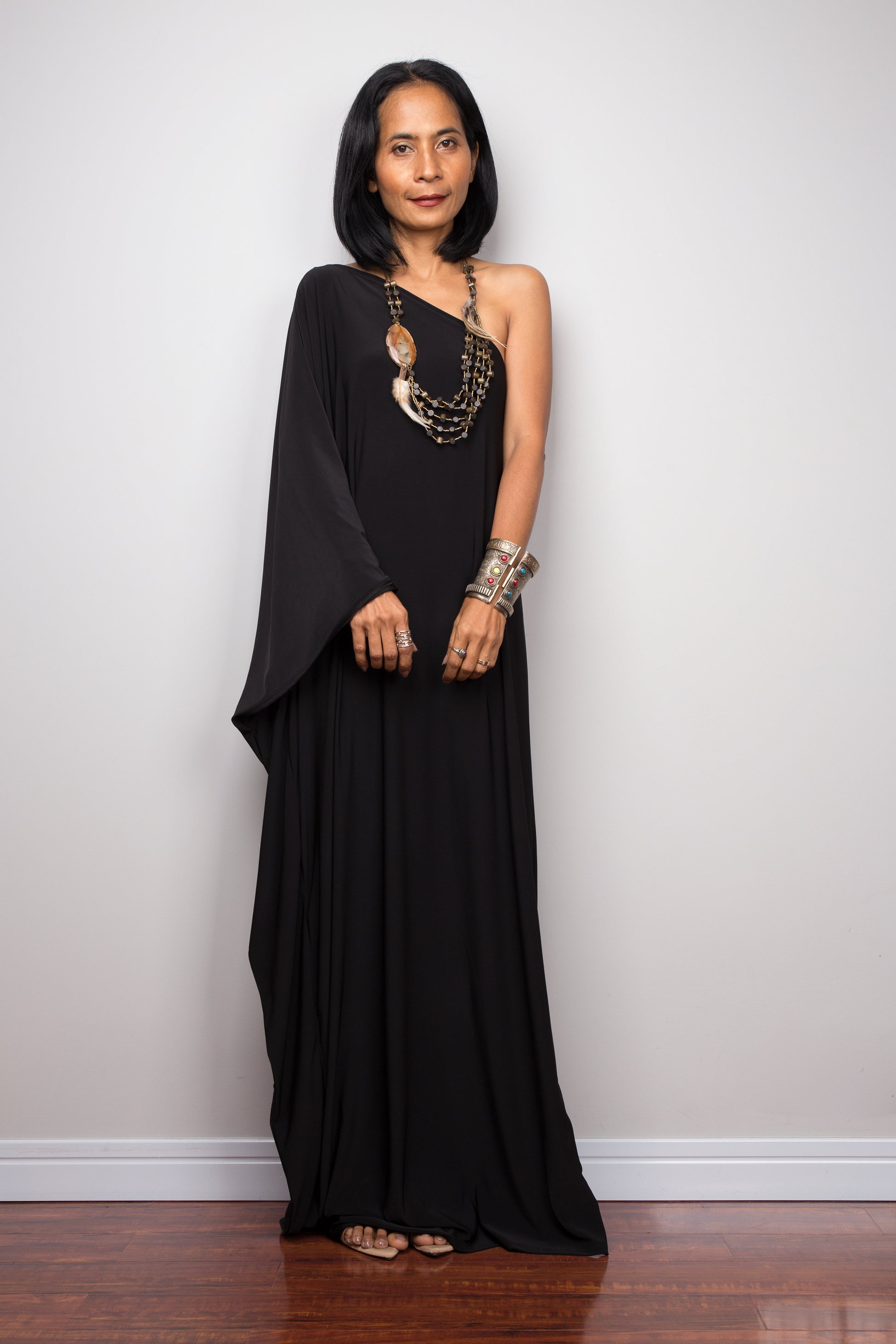 Black off shoulder dress. Front view long black dress.