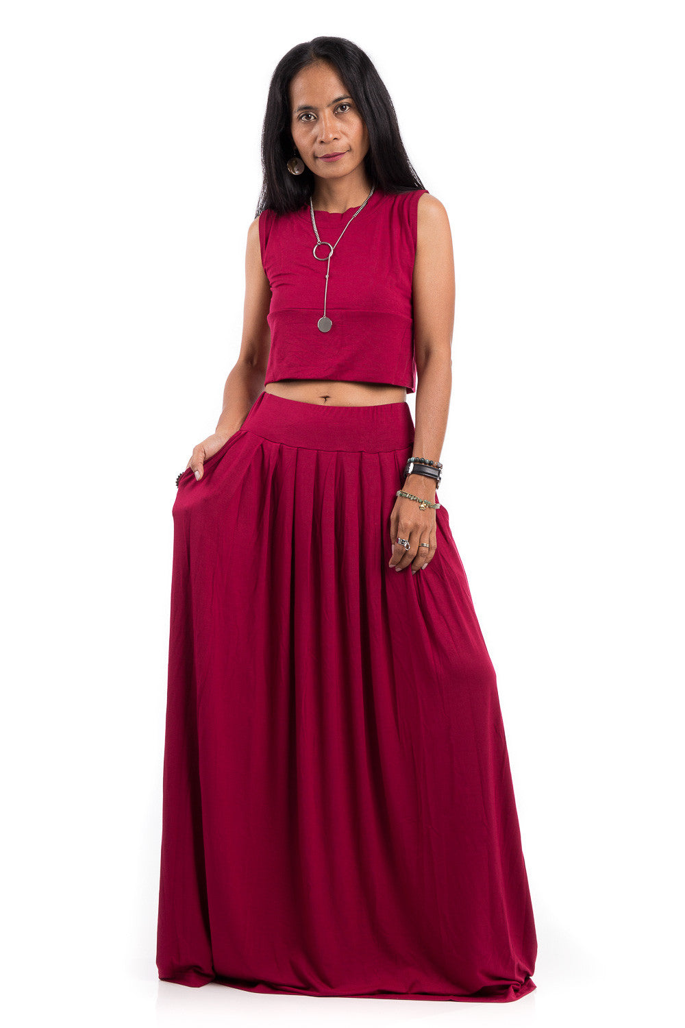 Red maxi skirt.  Long pleated skirt with high waist band and pockets on either side. 