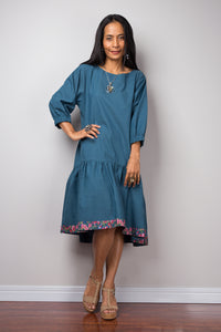 Midi dress with sleeves and floral detail