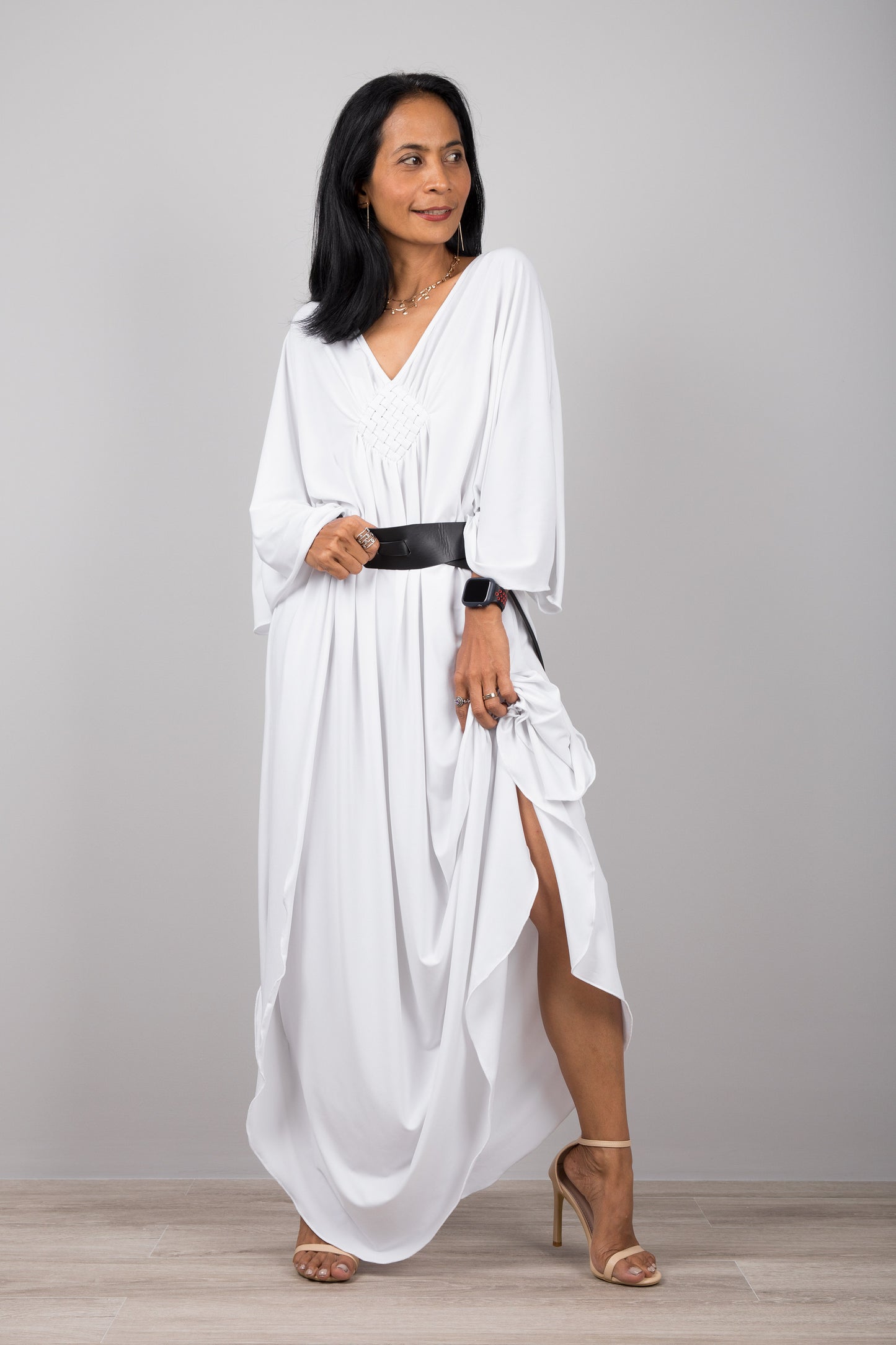 White kaftan dress with plunging neckline.  Buy your timeless kaftans online from Nuichan.  Express worldwide delivery via DHL.
